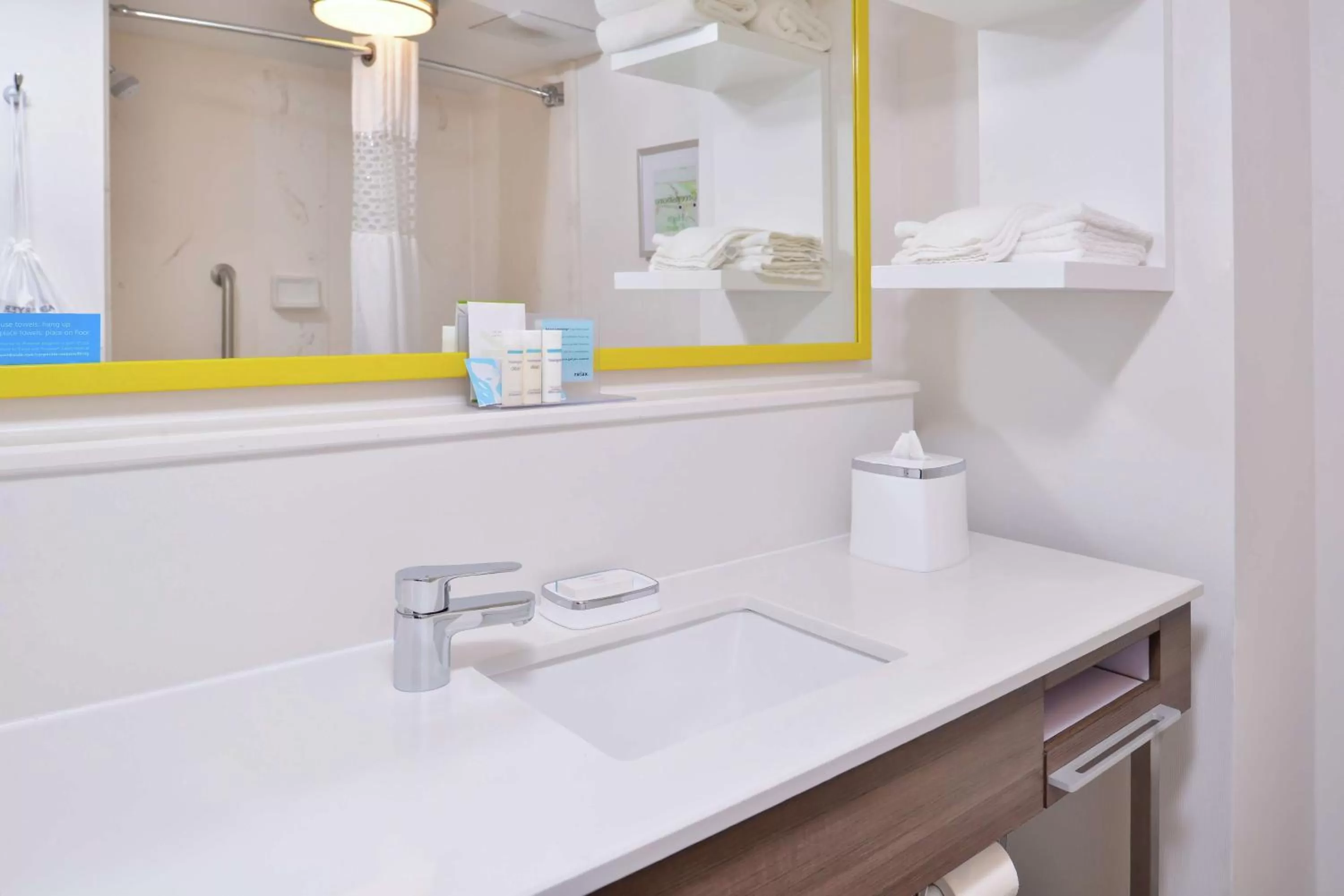 Bathroom in Hampton Inn Greensboro East / McLeansville