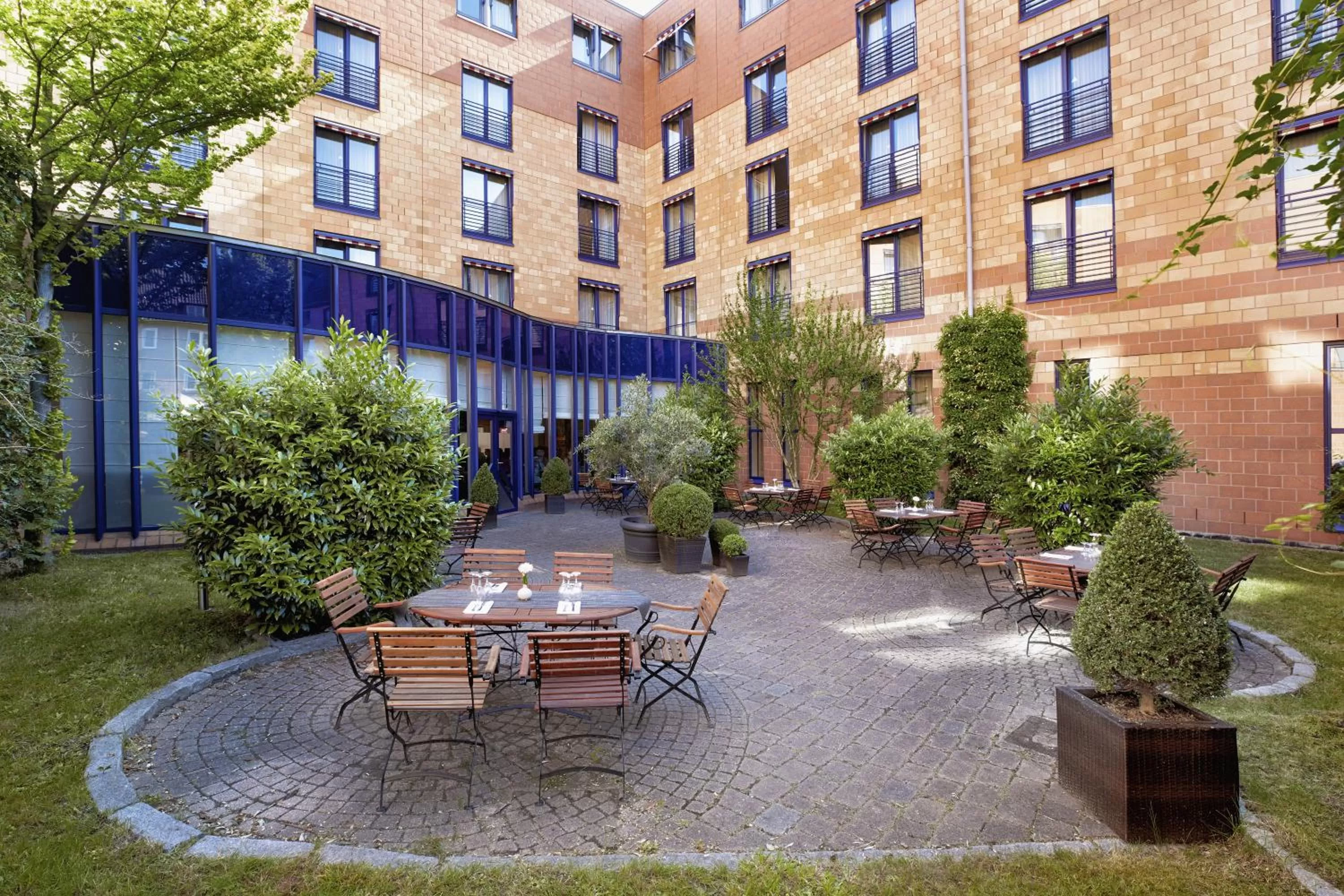 Patio in H4 Hotel Hamburg Bergedorf, Trademark Collection by Wyndham