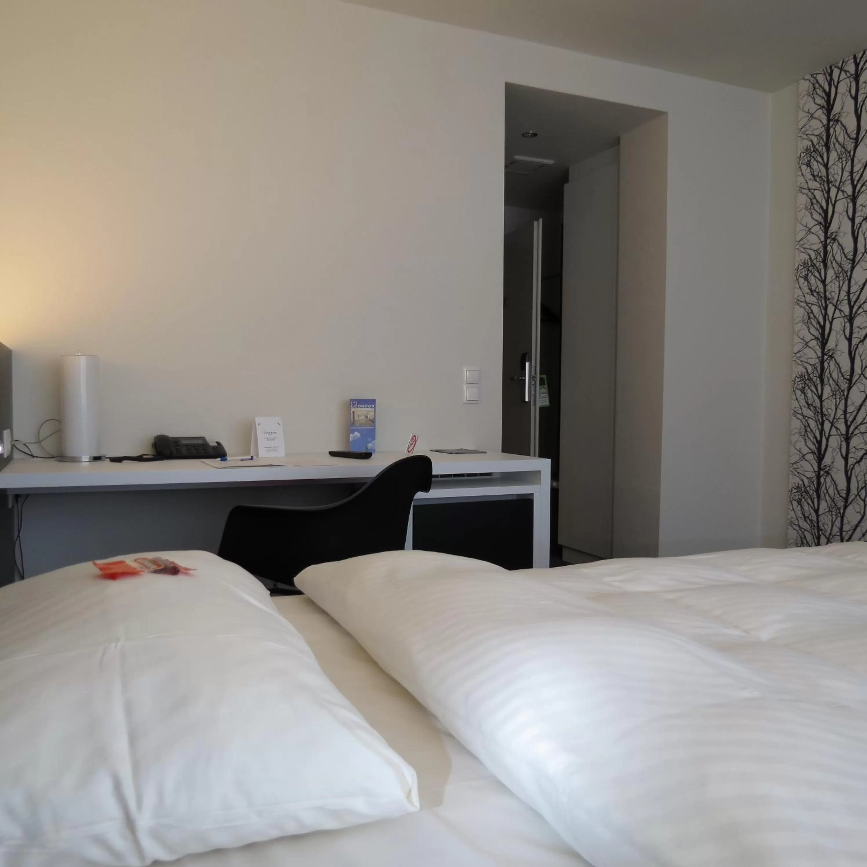 Bed in Comfor Hotel Ulm City