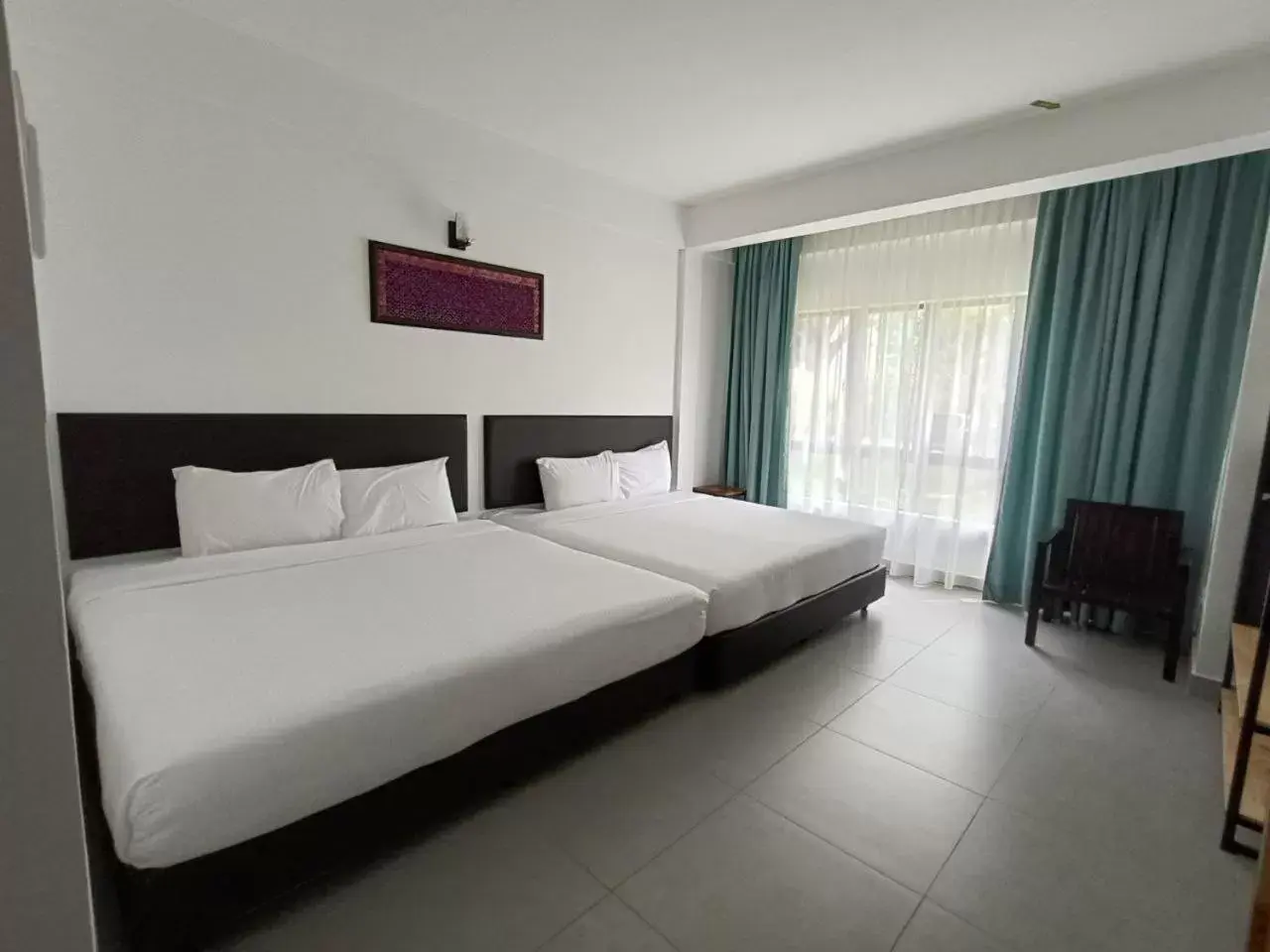 Deluxe Quad Garden View in ēRYA by SURIA Hot Spring Bentong Deluxe Quad Garden View in ēRYA by SURIA Hot Spring Bentong