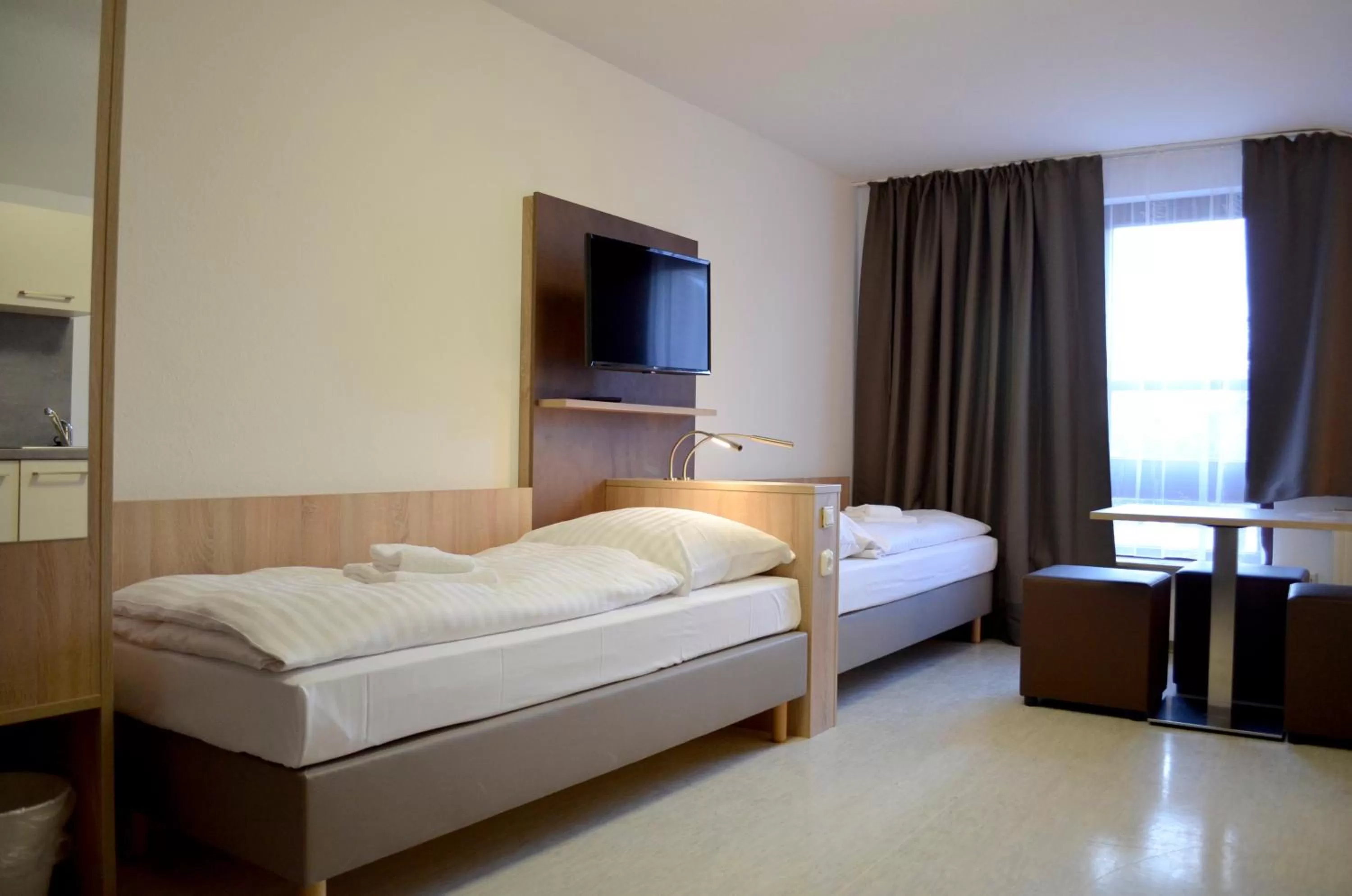 Bed in Hana Aparthotel