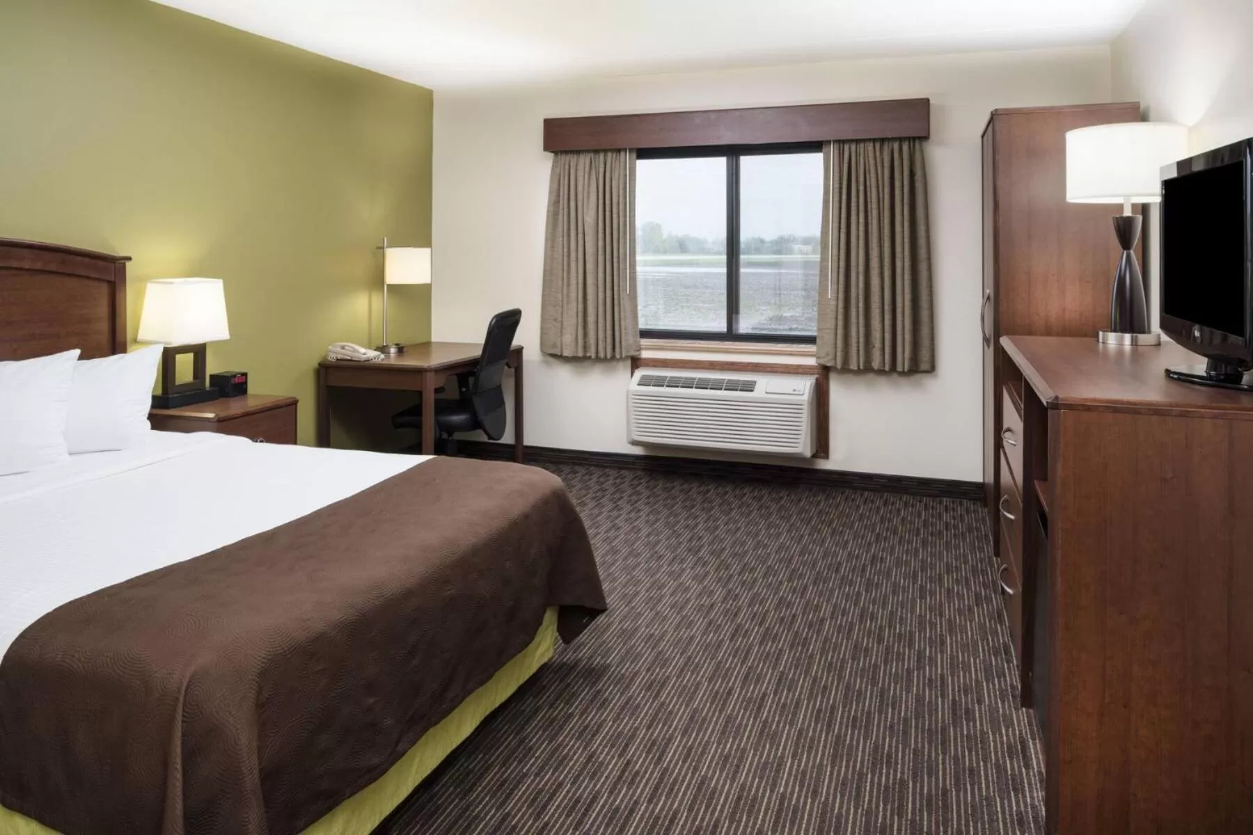 Bed in AmericInn by Wyndham Wahpeton