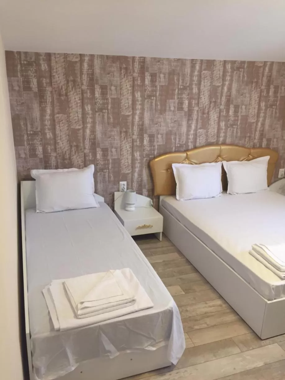 Bed in Family Hotel Malibu