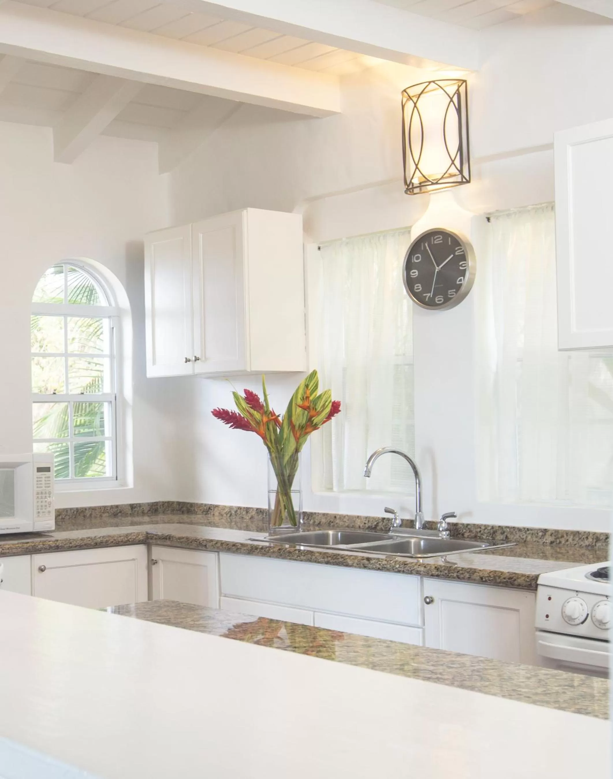 Kitchen or kitchenette in Windjammer Landing Resort and Residences