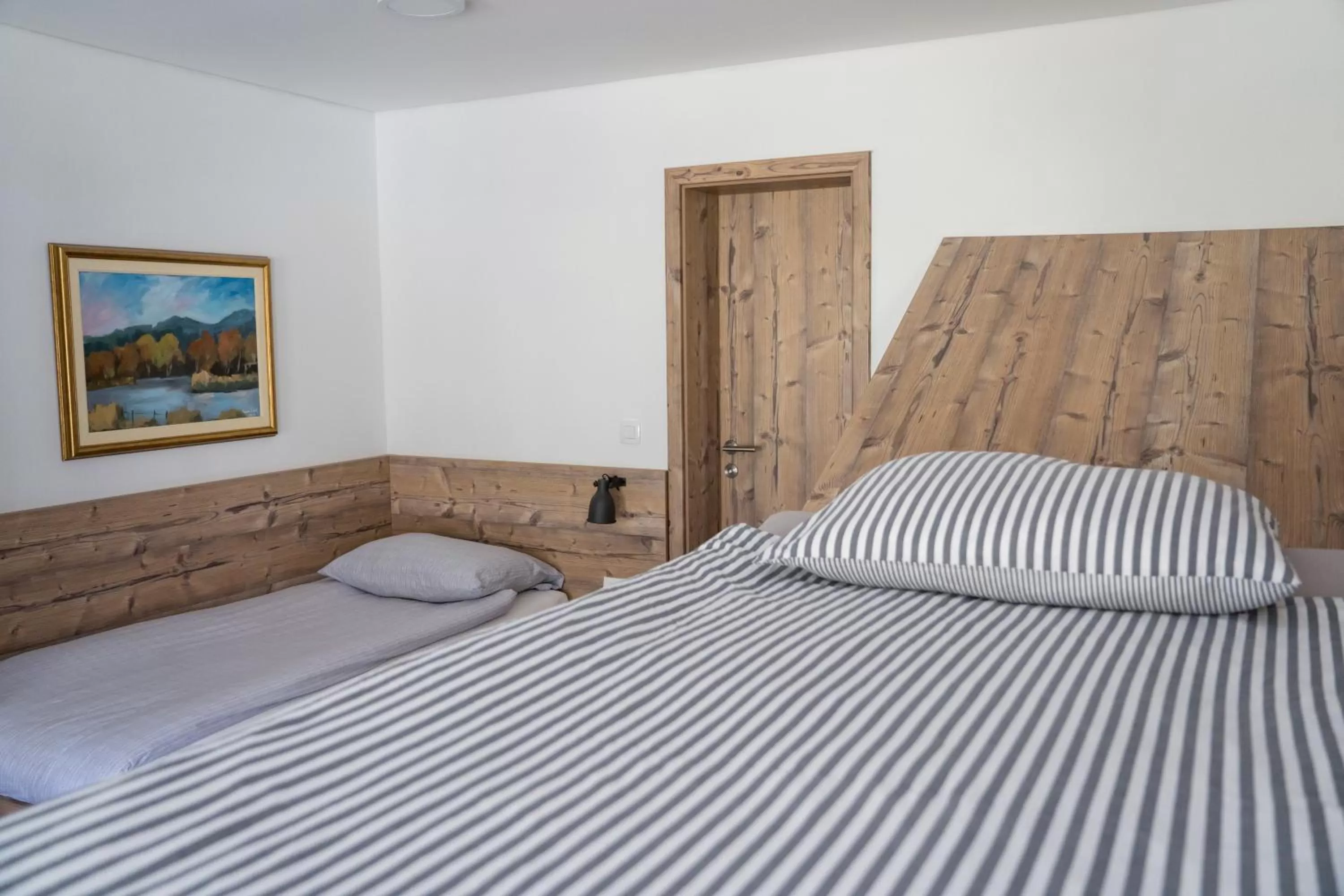 Bed in Hiša Poljana Rooms