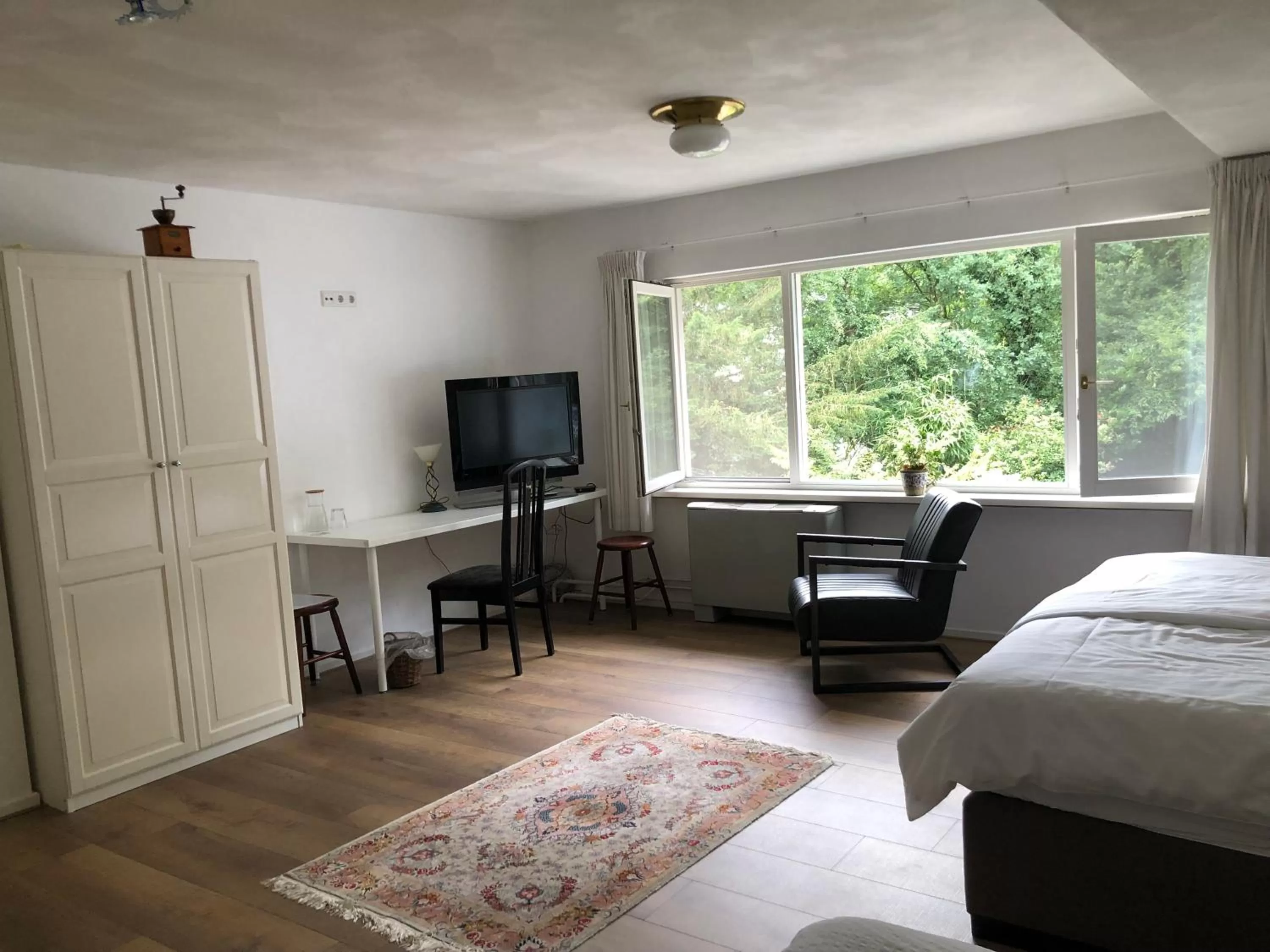 Seating area, Bed in B&B Het Zonnehuis Boxtel