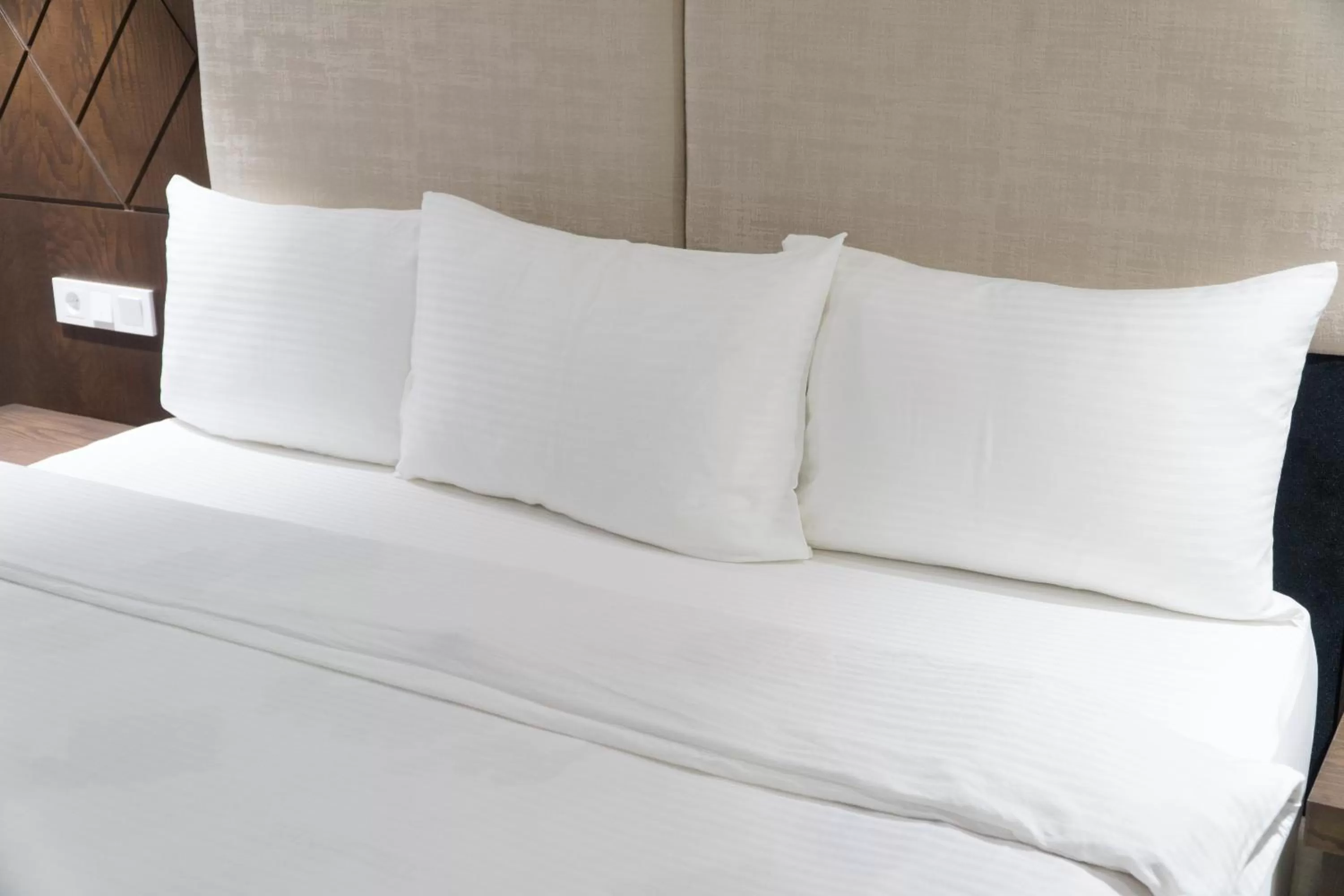 Bed in East Palace Hotel