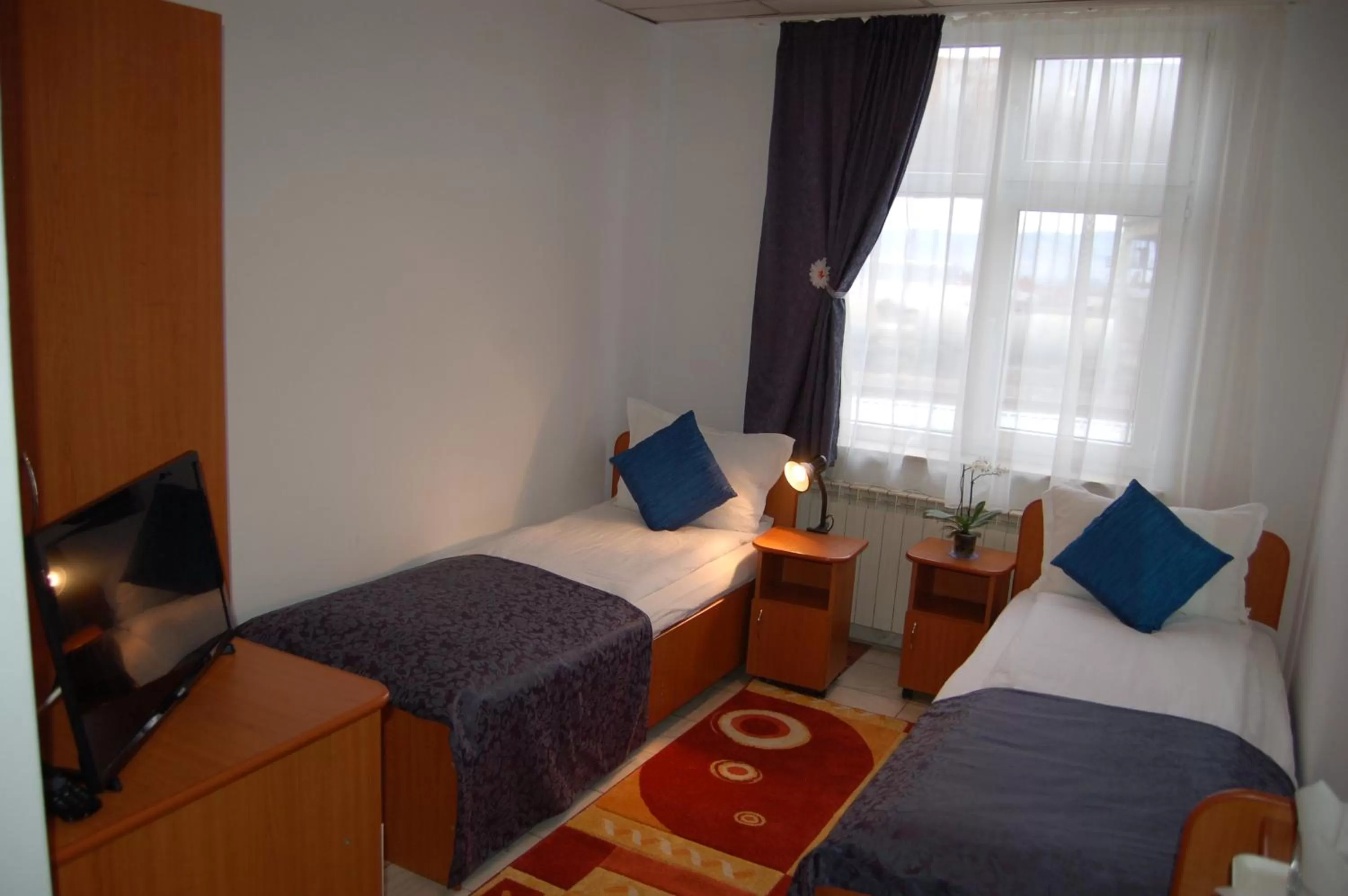 Bed in Motel Maestro