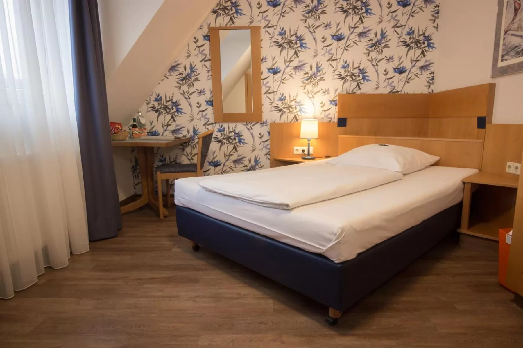 Photo of the whole room, Bed in Seehotel Adler