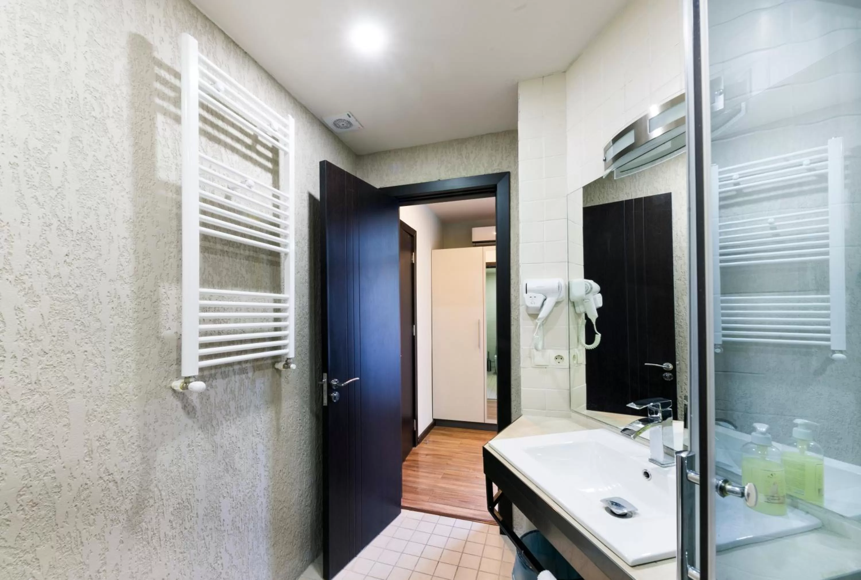 Bathroom in Sani Apart Hotel