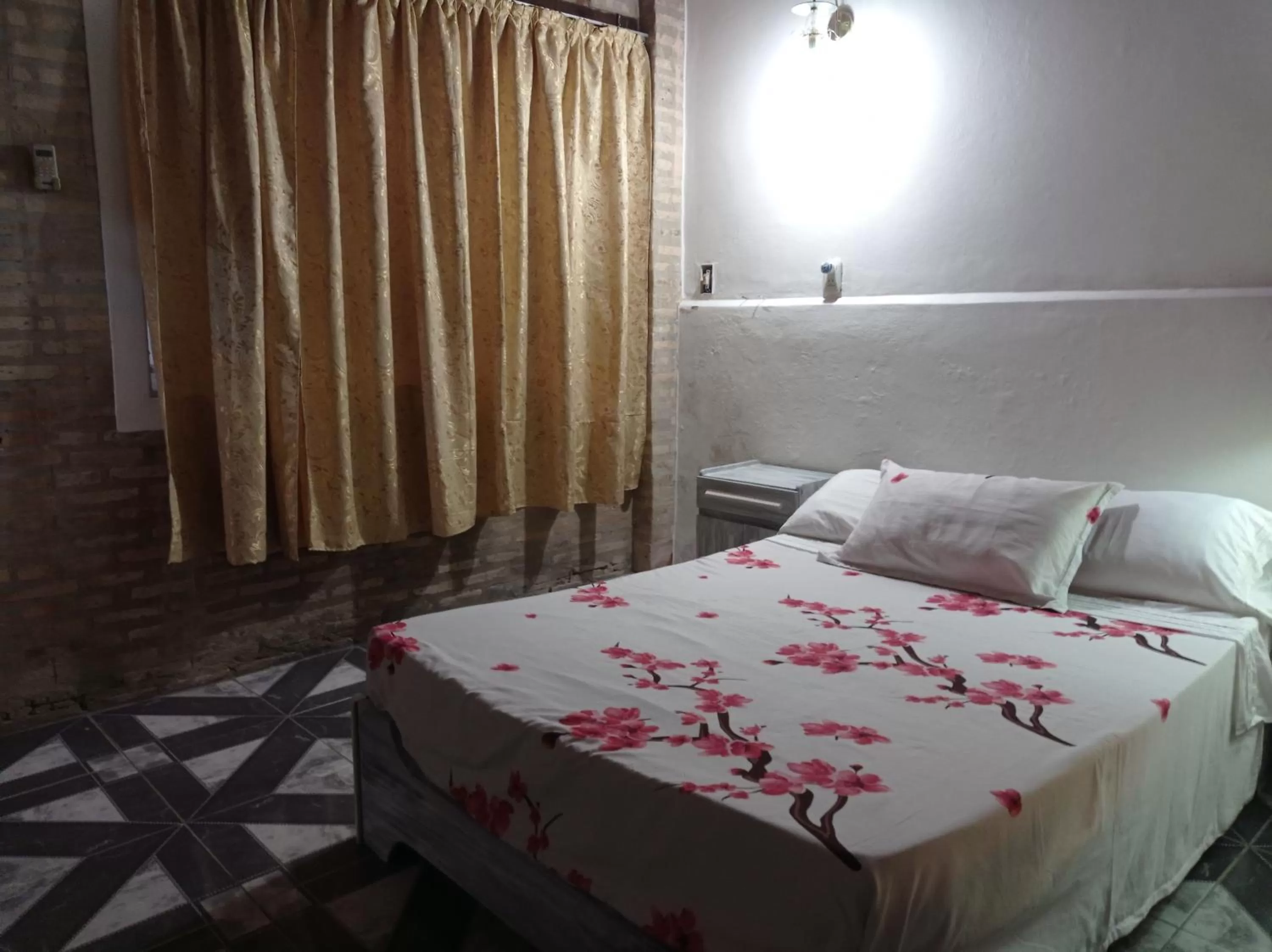 Bed in Hotel La Aparesida