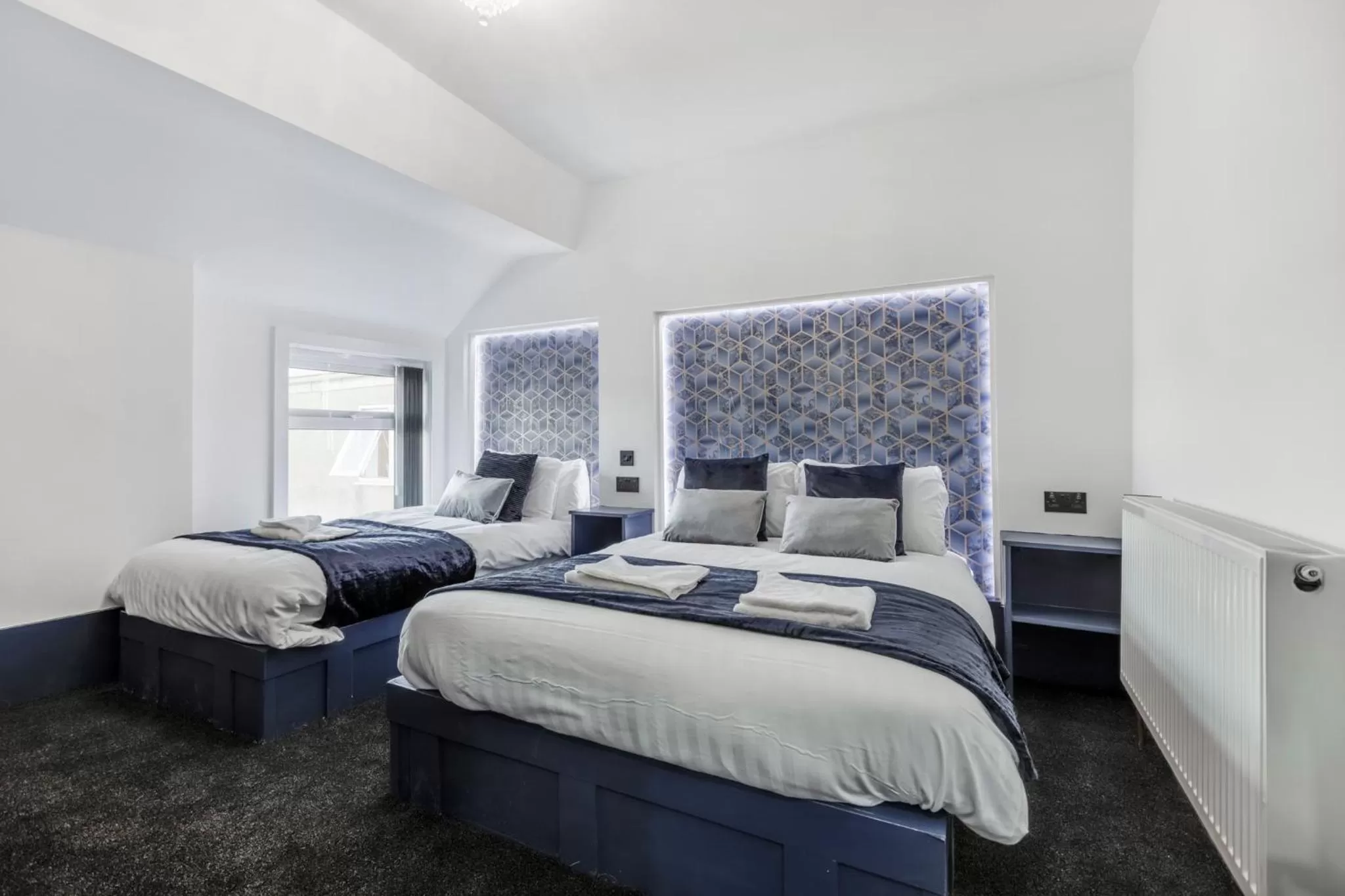 Bedroom, Bed in Crystal Towers Sasco Apartments