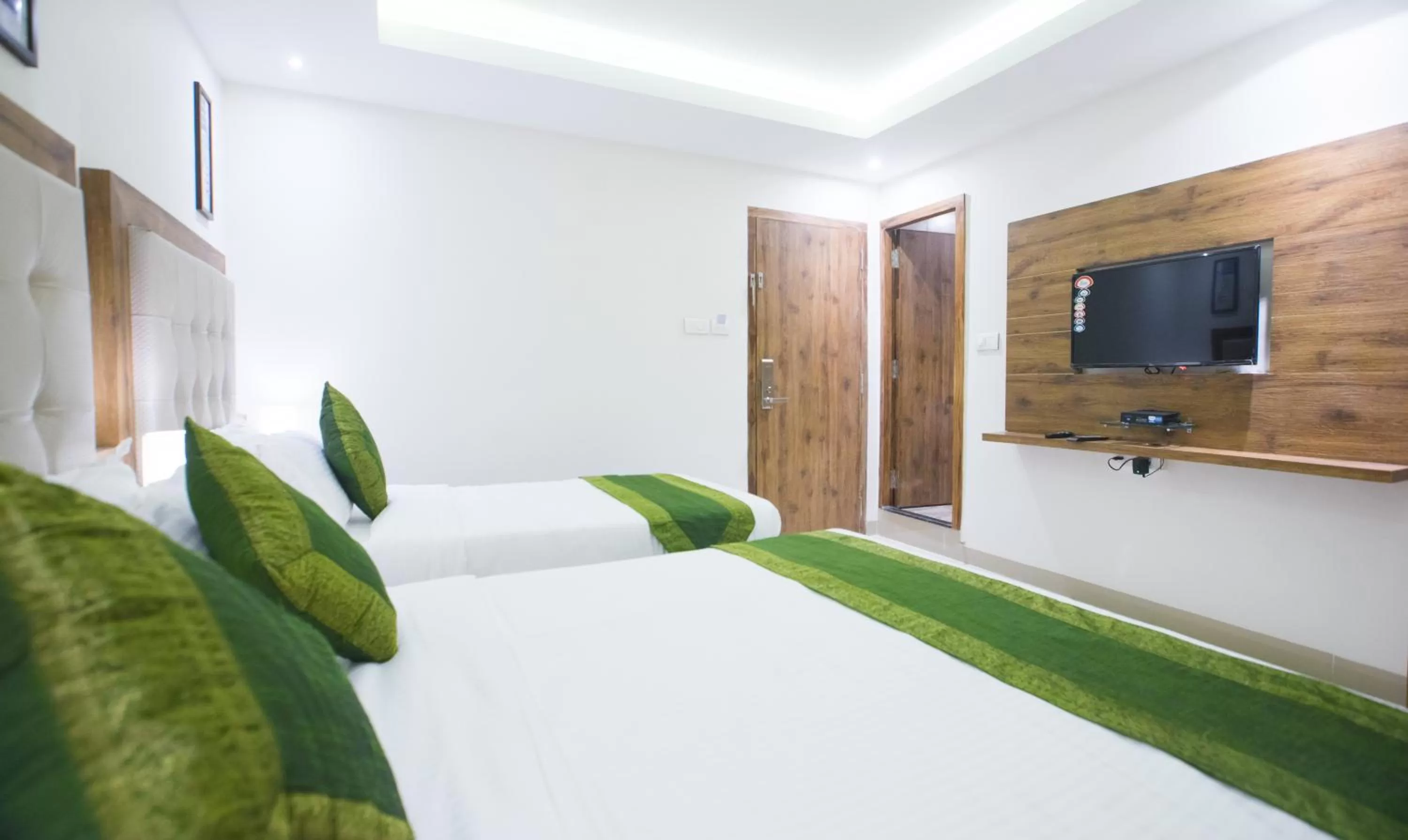 Bed in Treebo Amber International