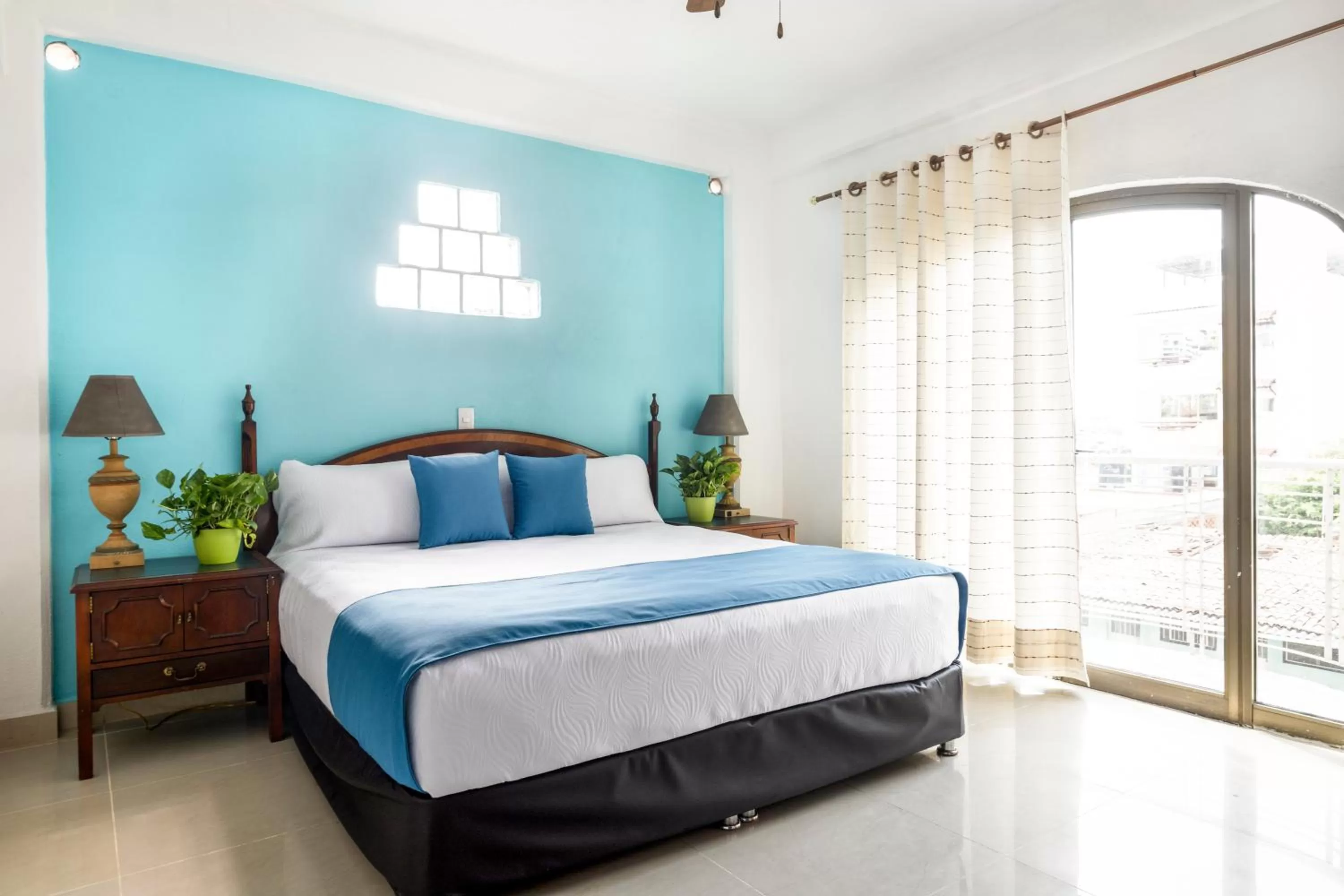 Bed in Hotel Pueblito Vallarta