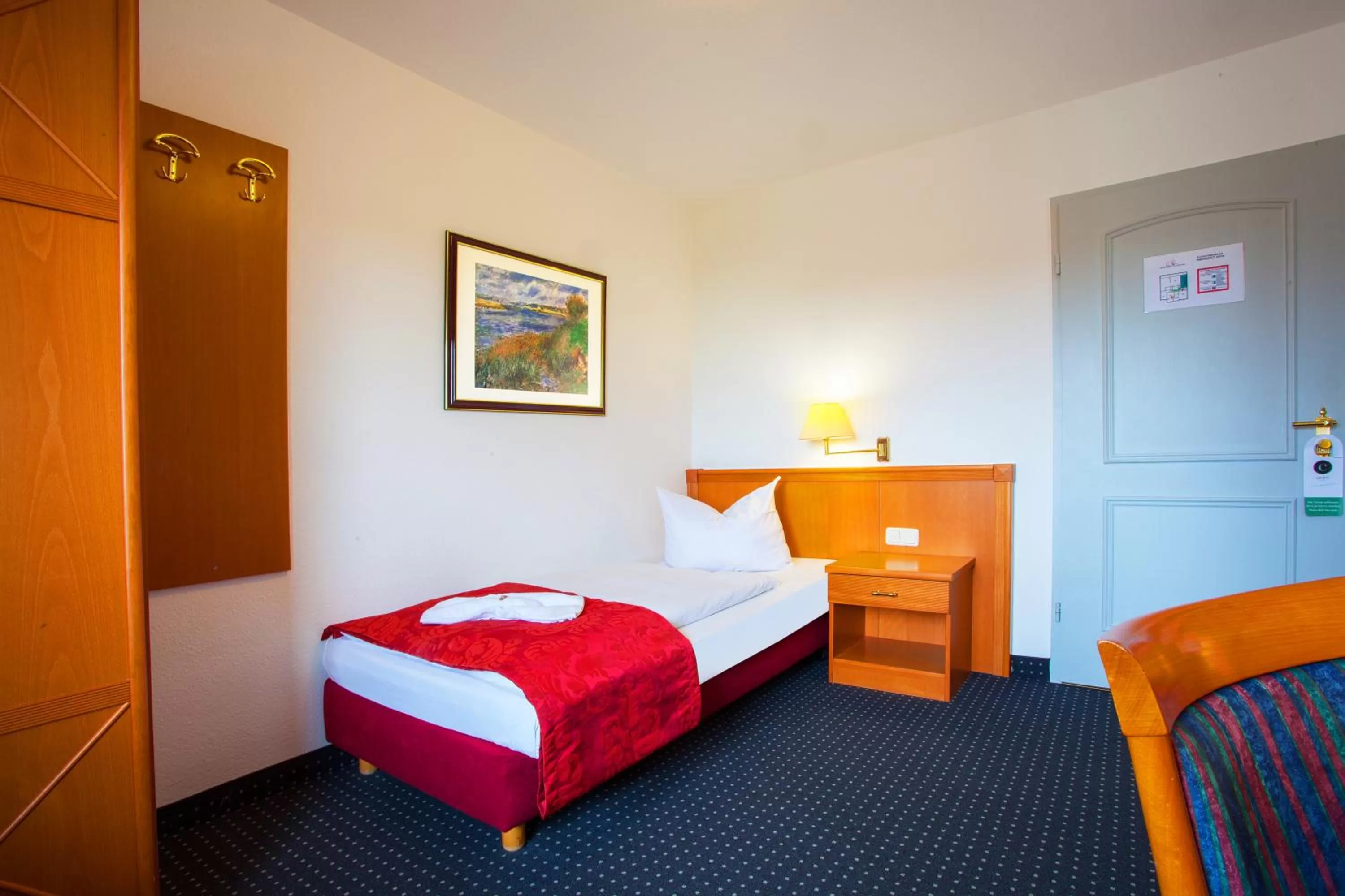 Bed in INA Hotel Royal