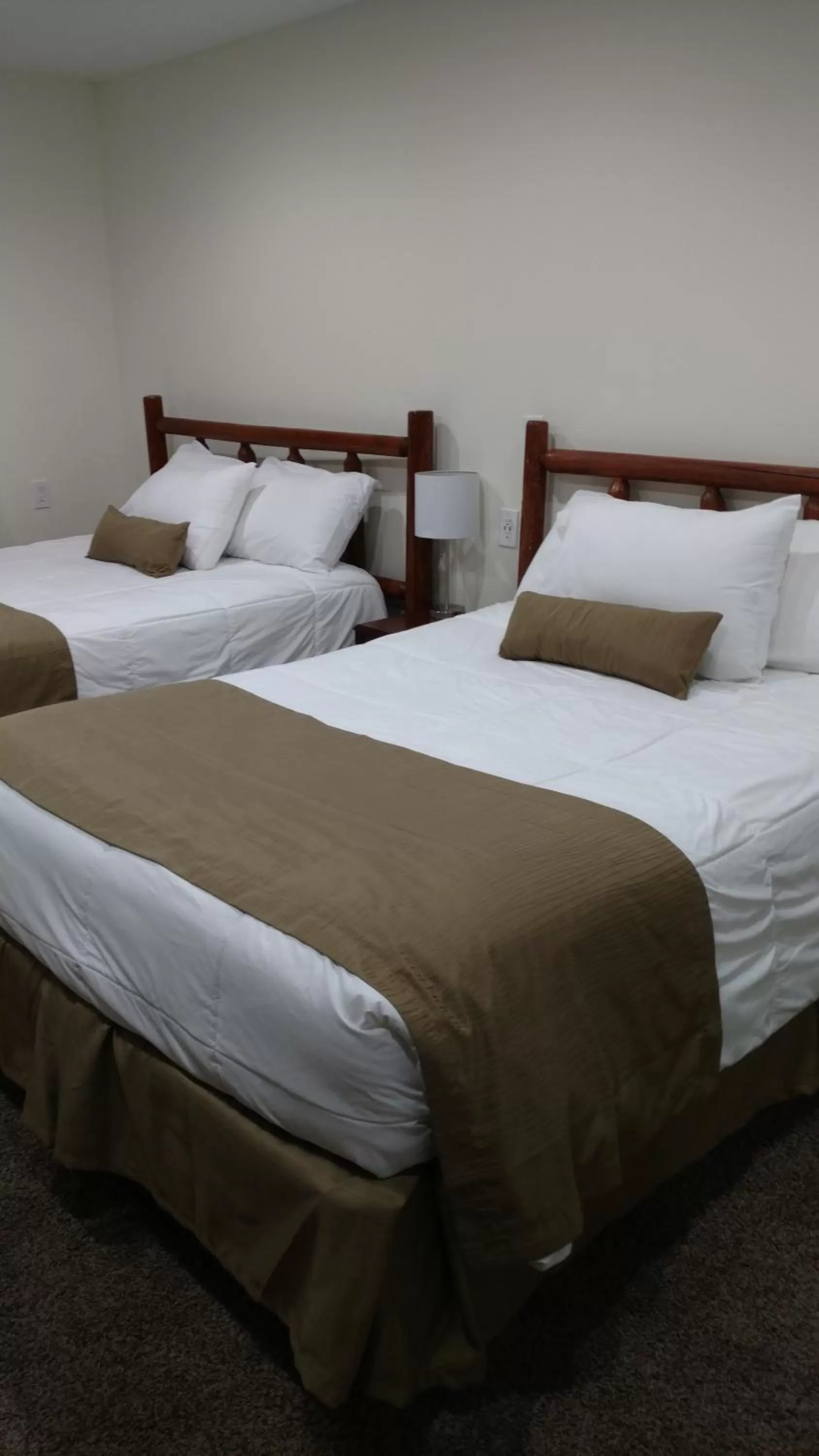 Bed in Cattlemen Motel