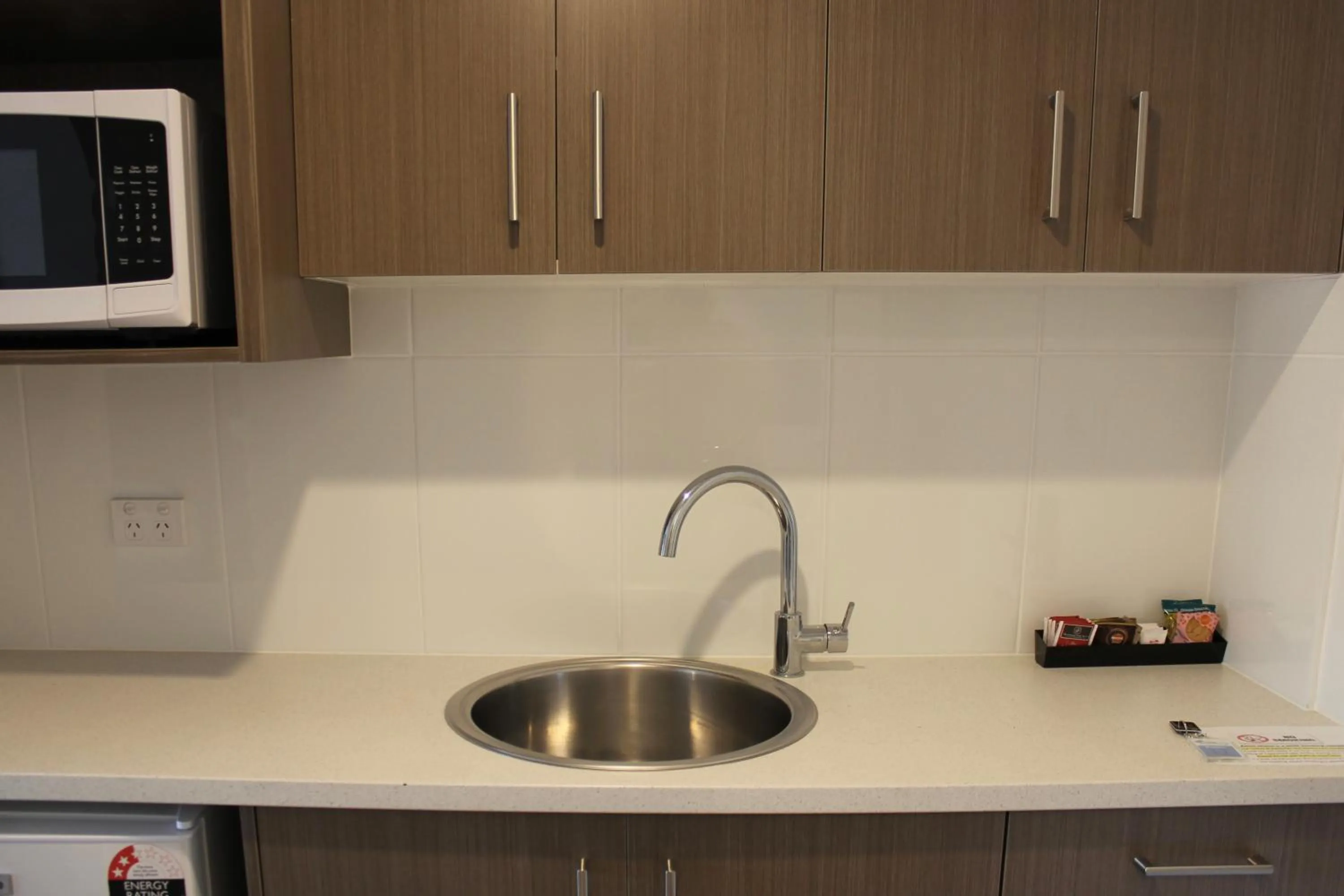 Kitchen or kitchenette in Aston Motel Yamba