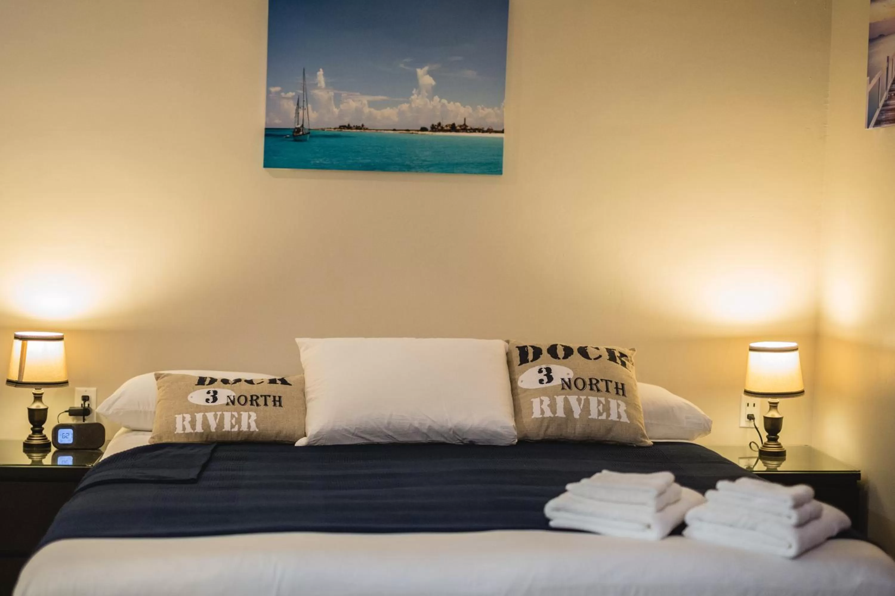 Bed in The Pier Beach Inn & Suites