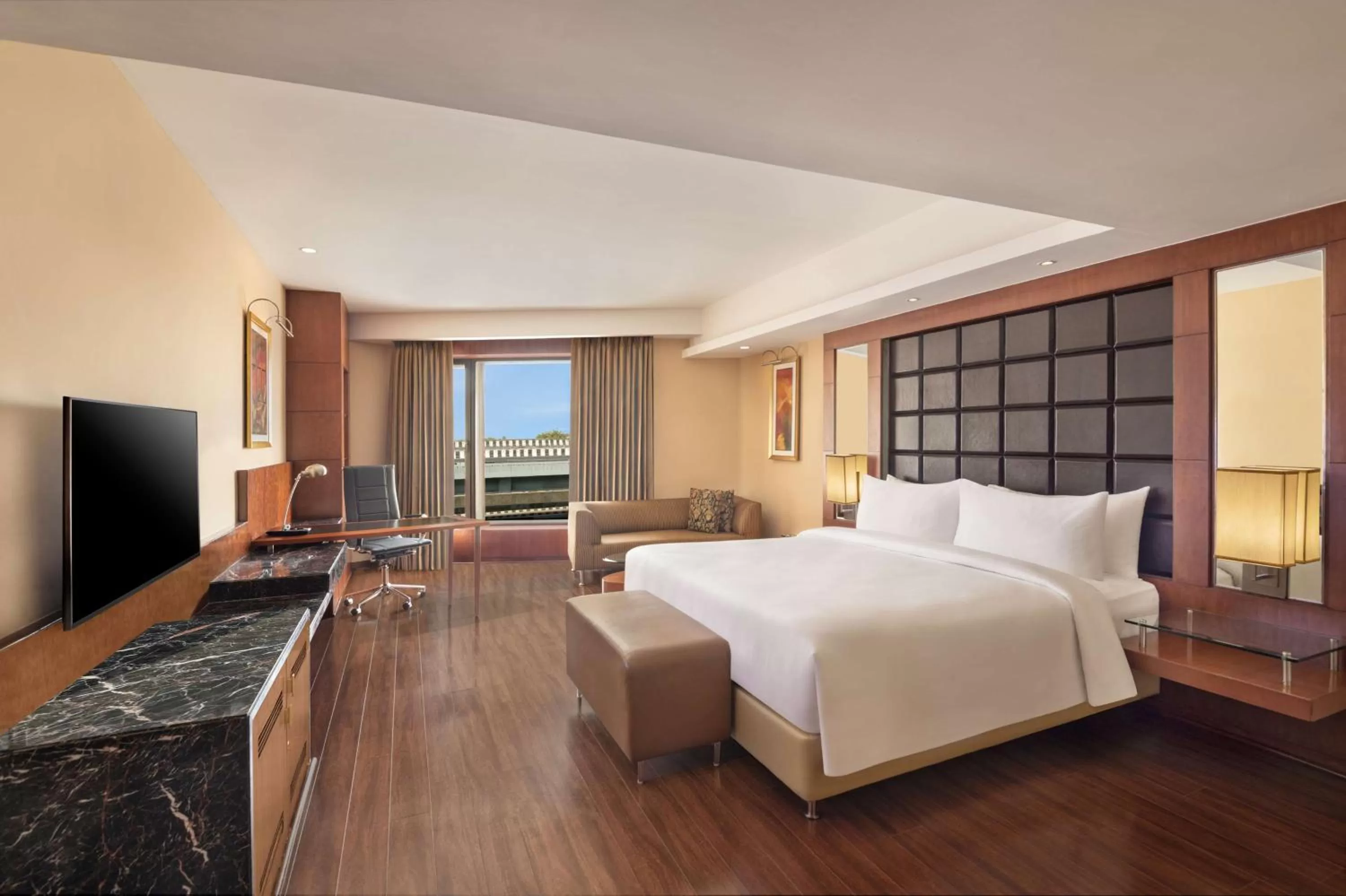 Photo of the whole room, Bed in Radisson Blu Plaza Delhi Airport
