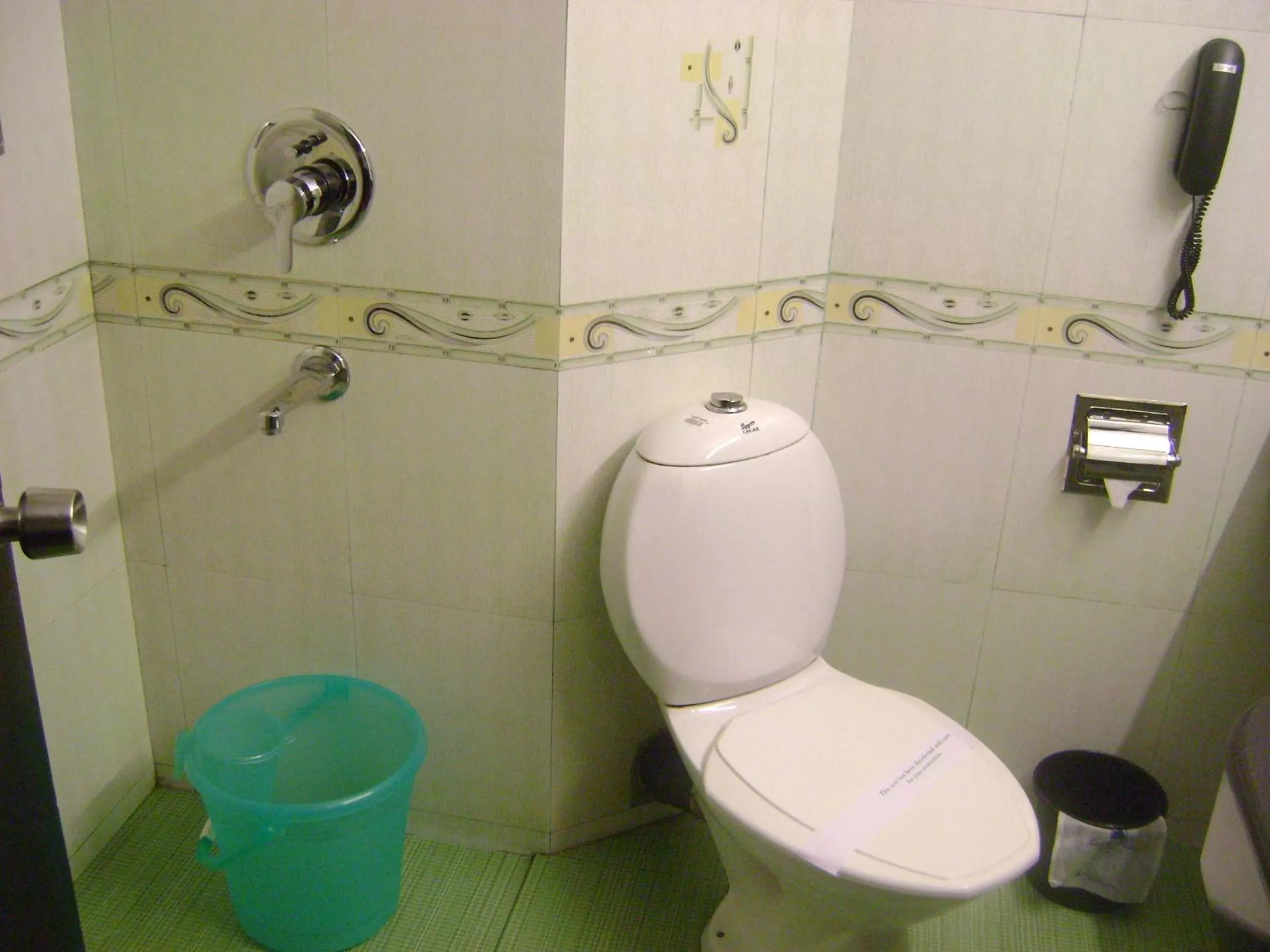 Toilet in Manuelsons Malabar Palace