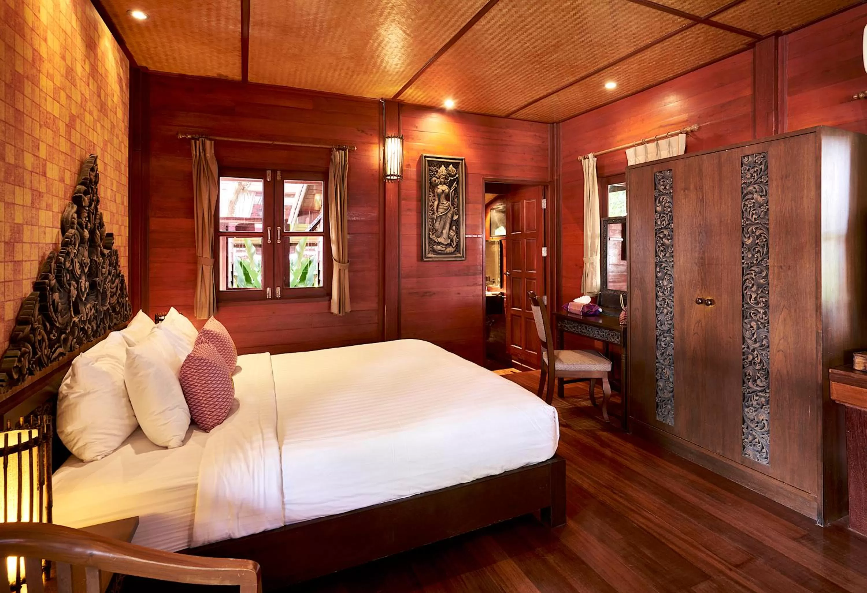 Bed in Ruenkanok Thaihouse Resort