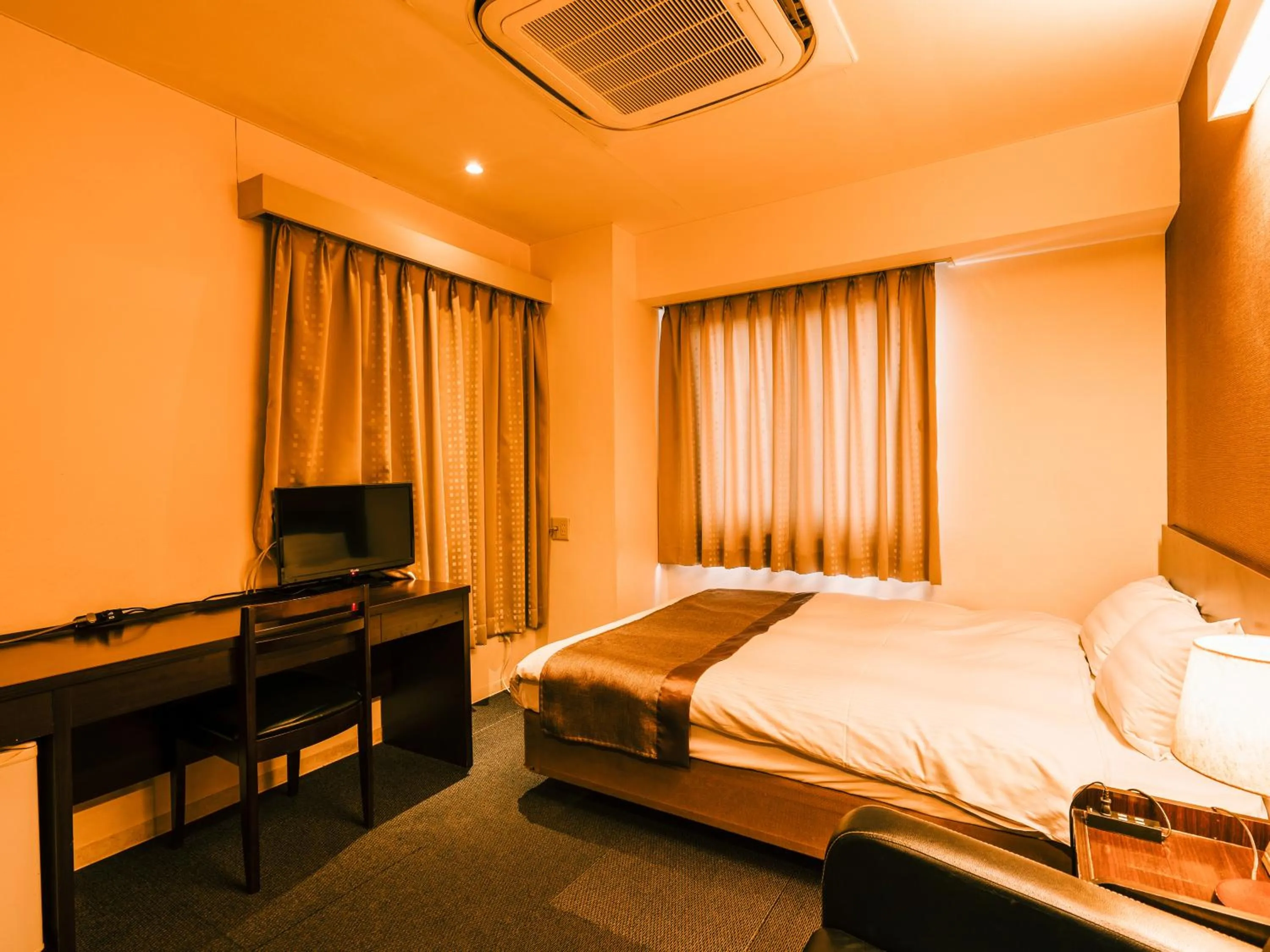 Photo of the whole room, Bed in Hotel AreaOne Takamatsu