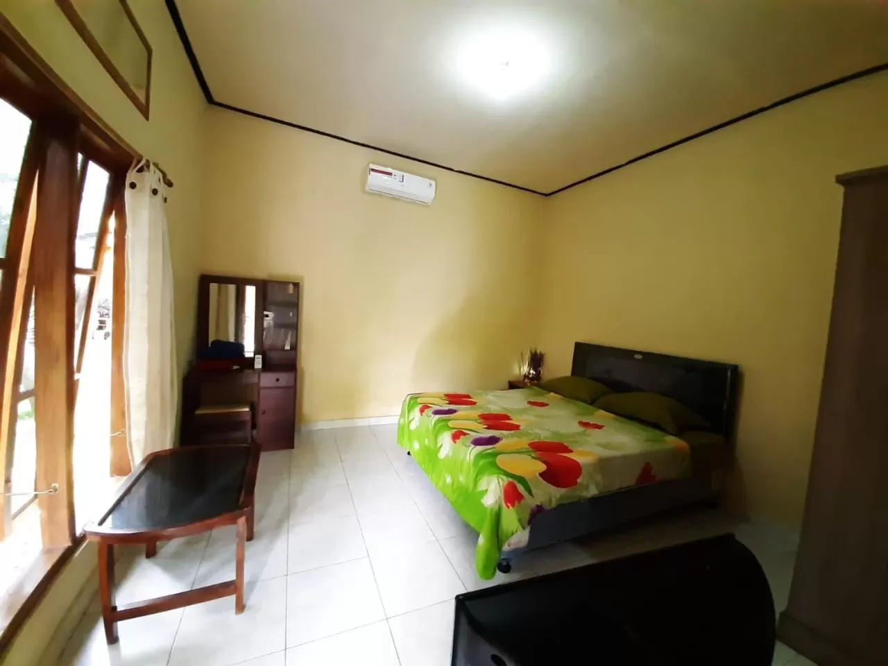 Bed in Penginapan Sedap Malam