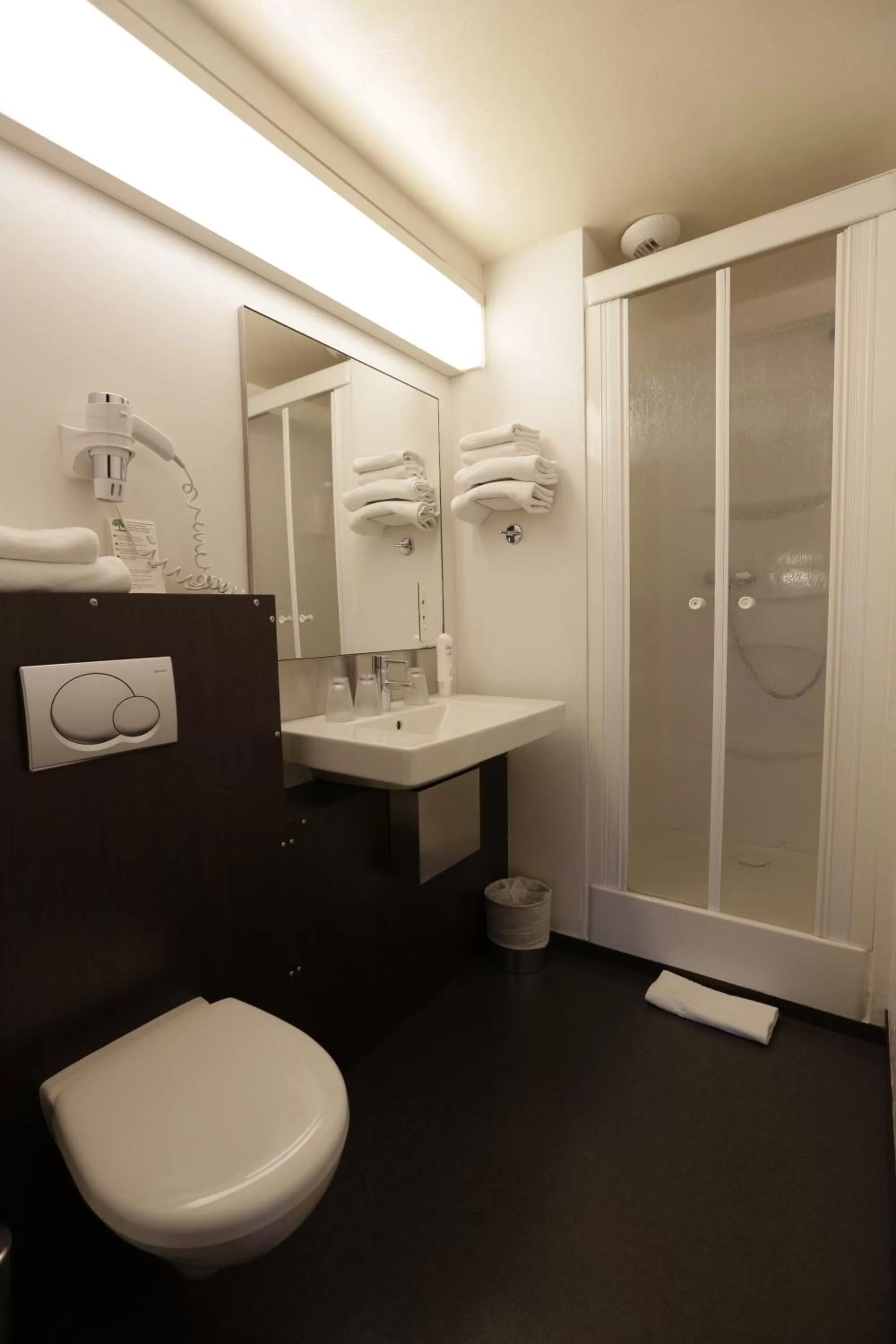 Bathroom in Hôtel Au Petit Caporal