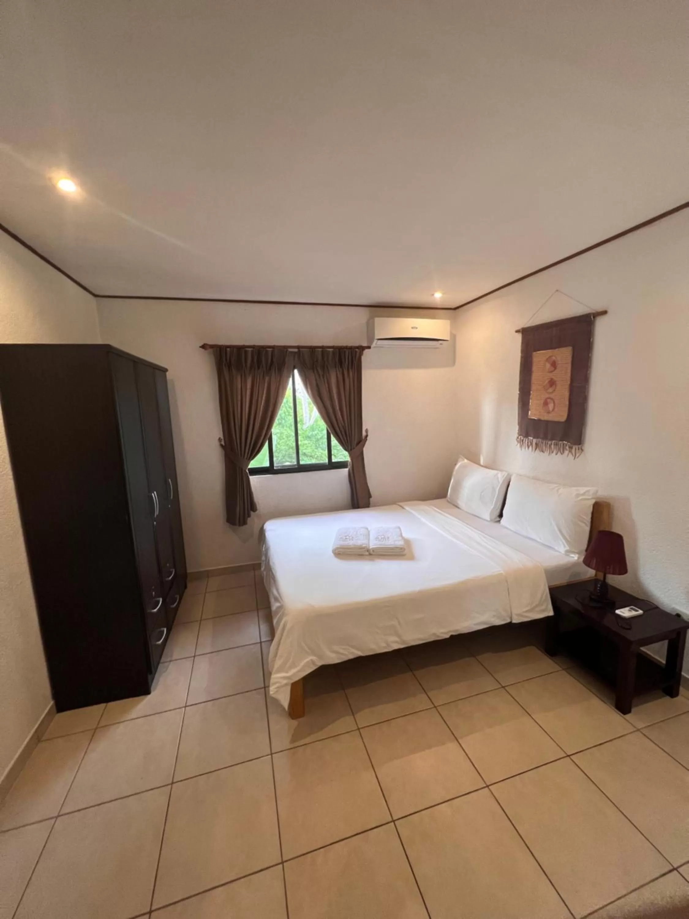 Bed in Alona Swiss Resort