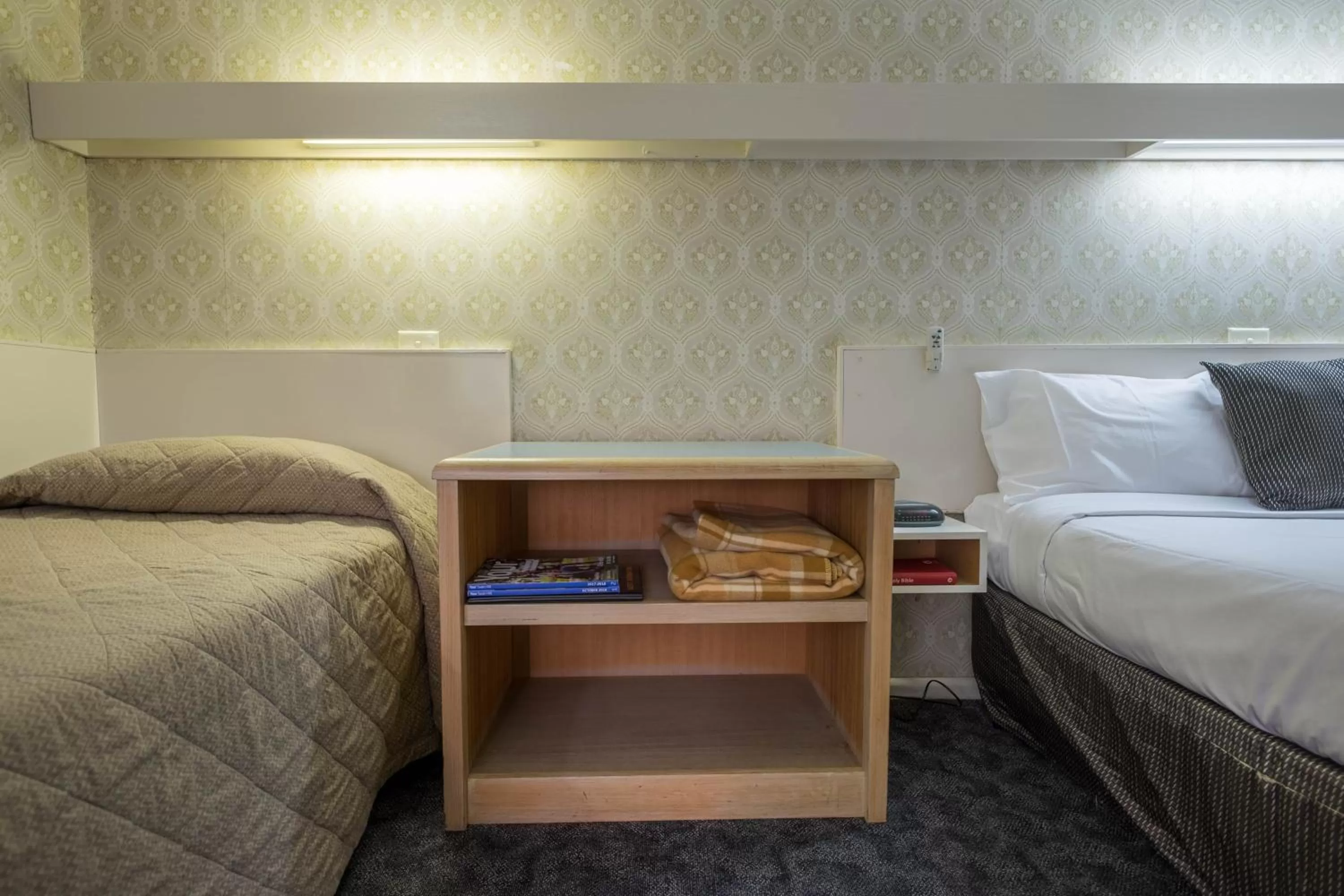 Bed in Pioneer Station Motor Inn