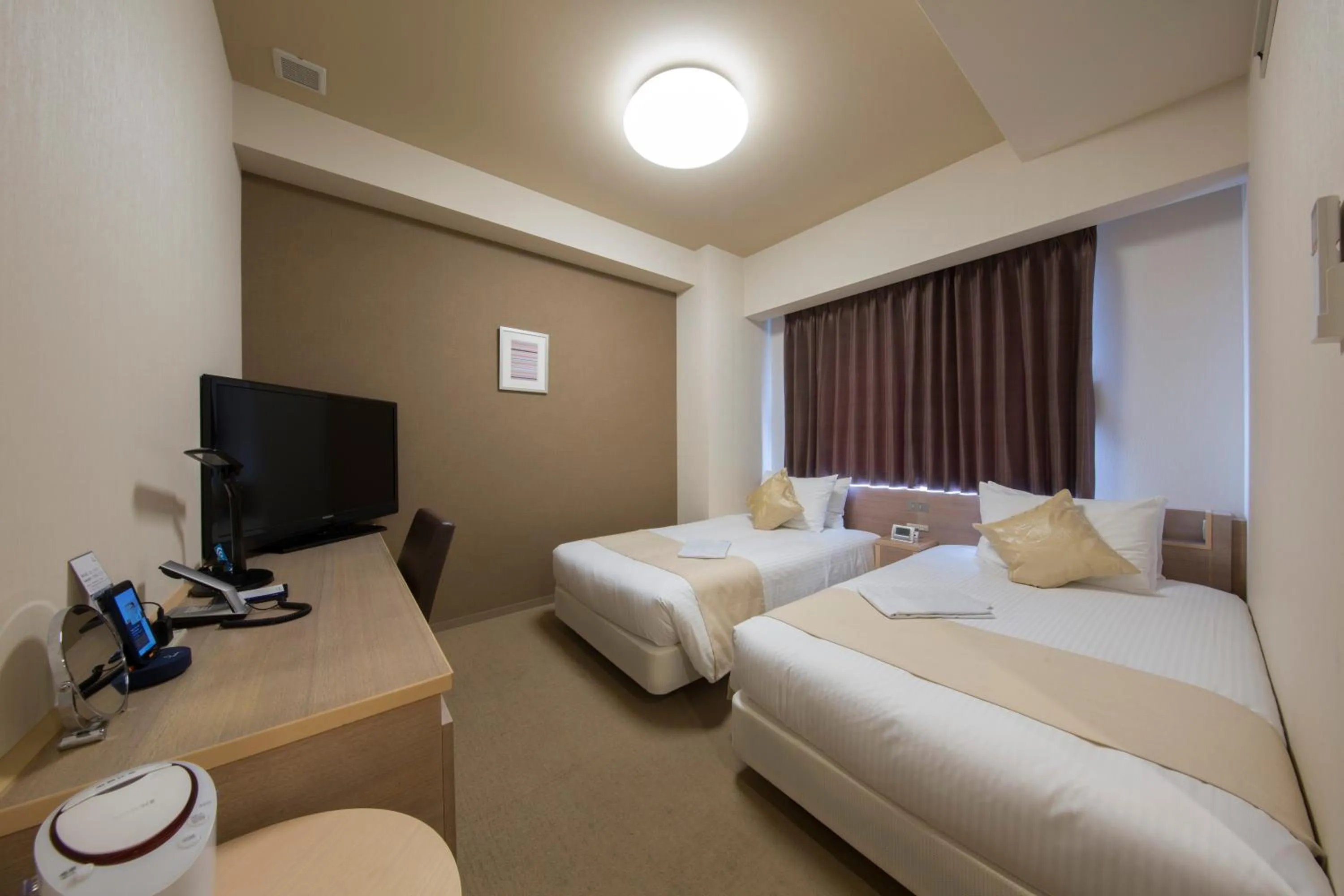 Photo of the whole room, Bed in Shizutetsu Hotel Prezio Numazu