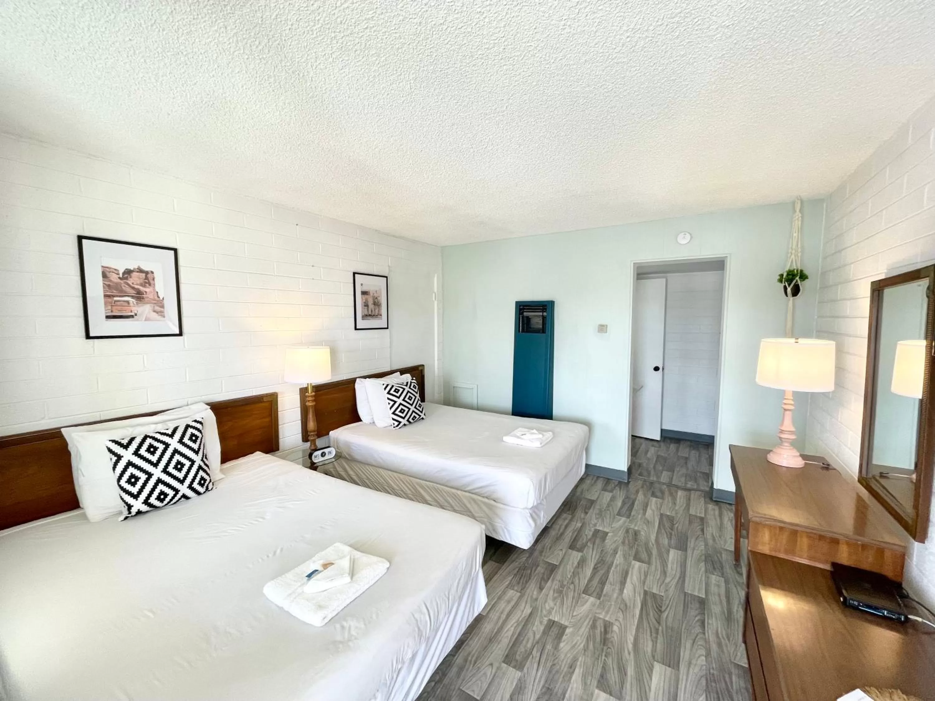 Bed in The Postcard Motel