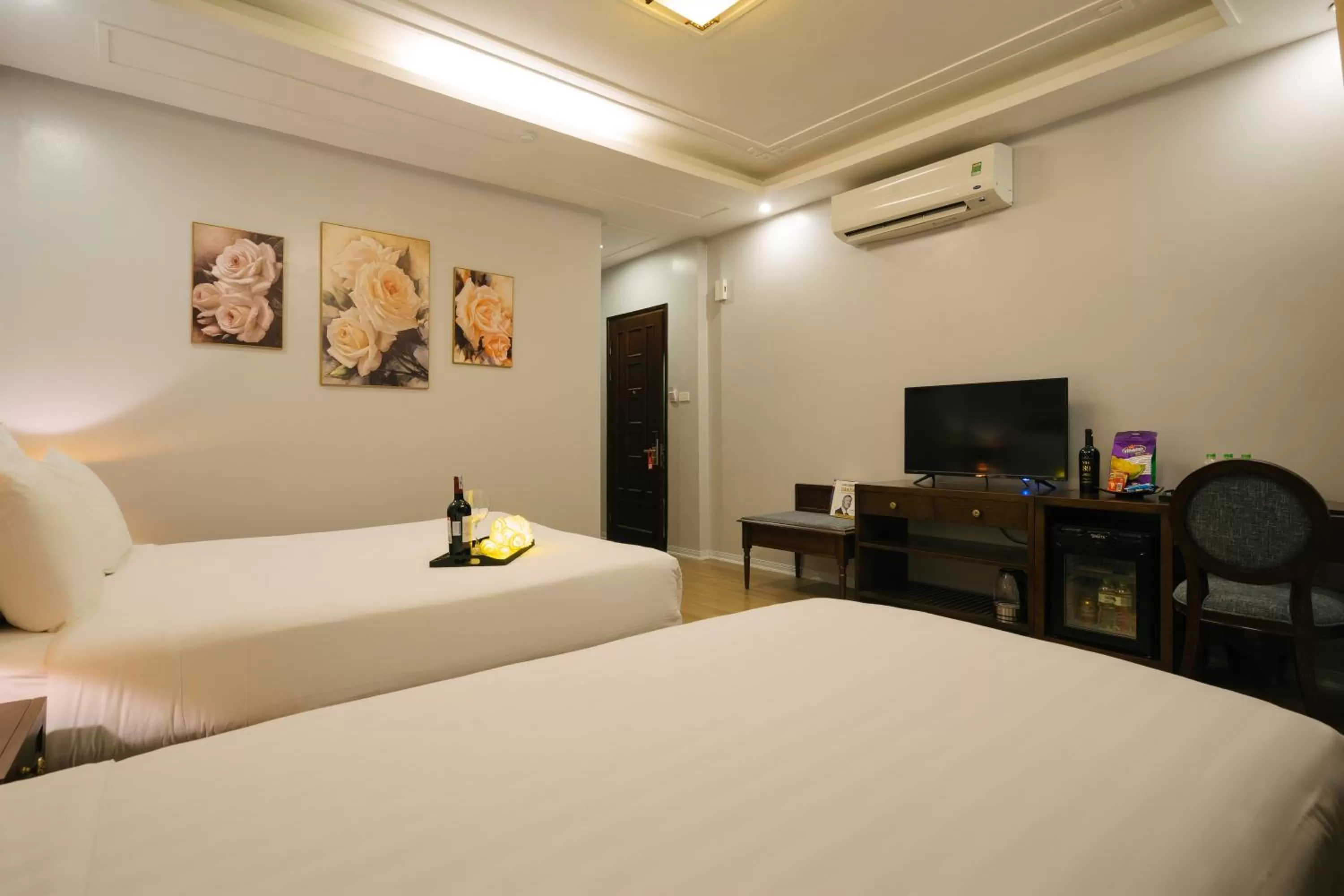 Bed in La Palm Hotel