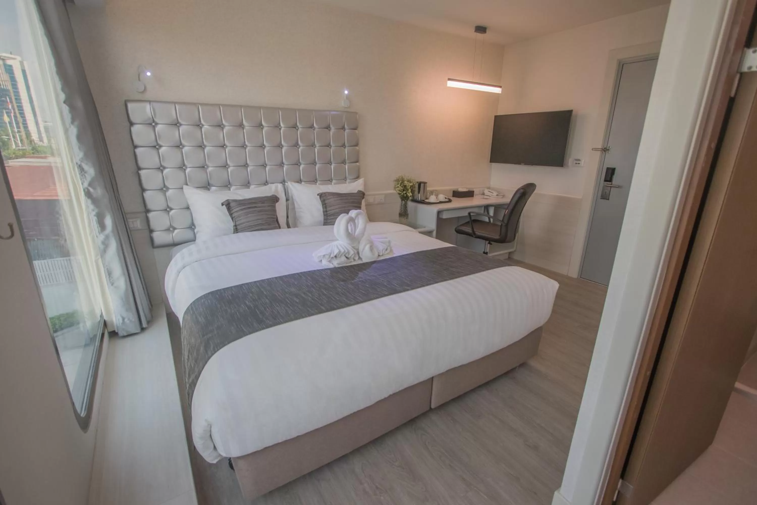 Bed in Justice Hotel