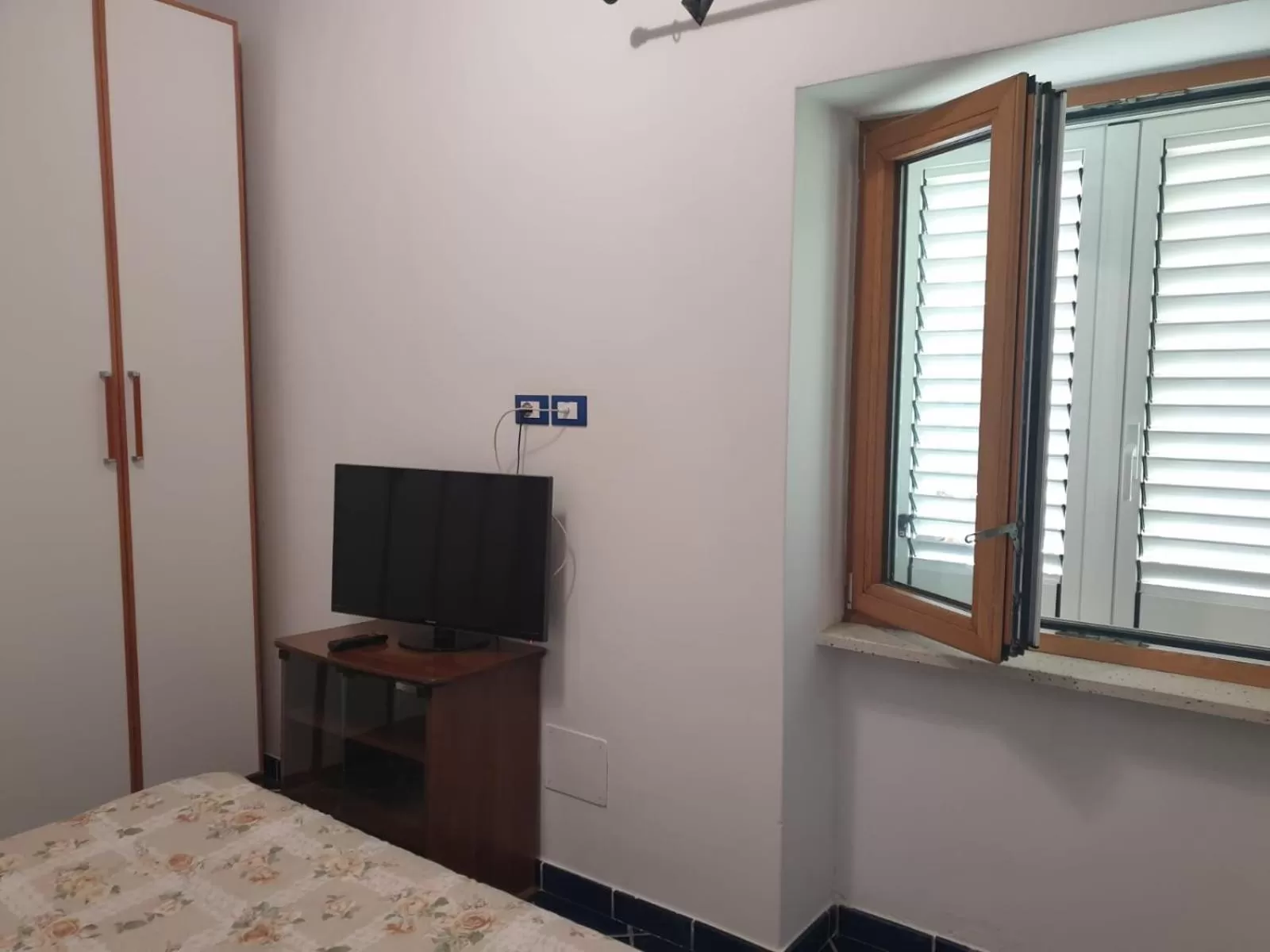 Photo of the whole room, TV/Entertainment Center in Hotel Mareluna Ischia