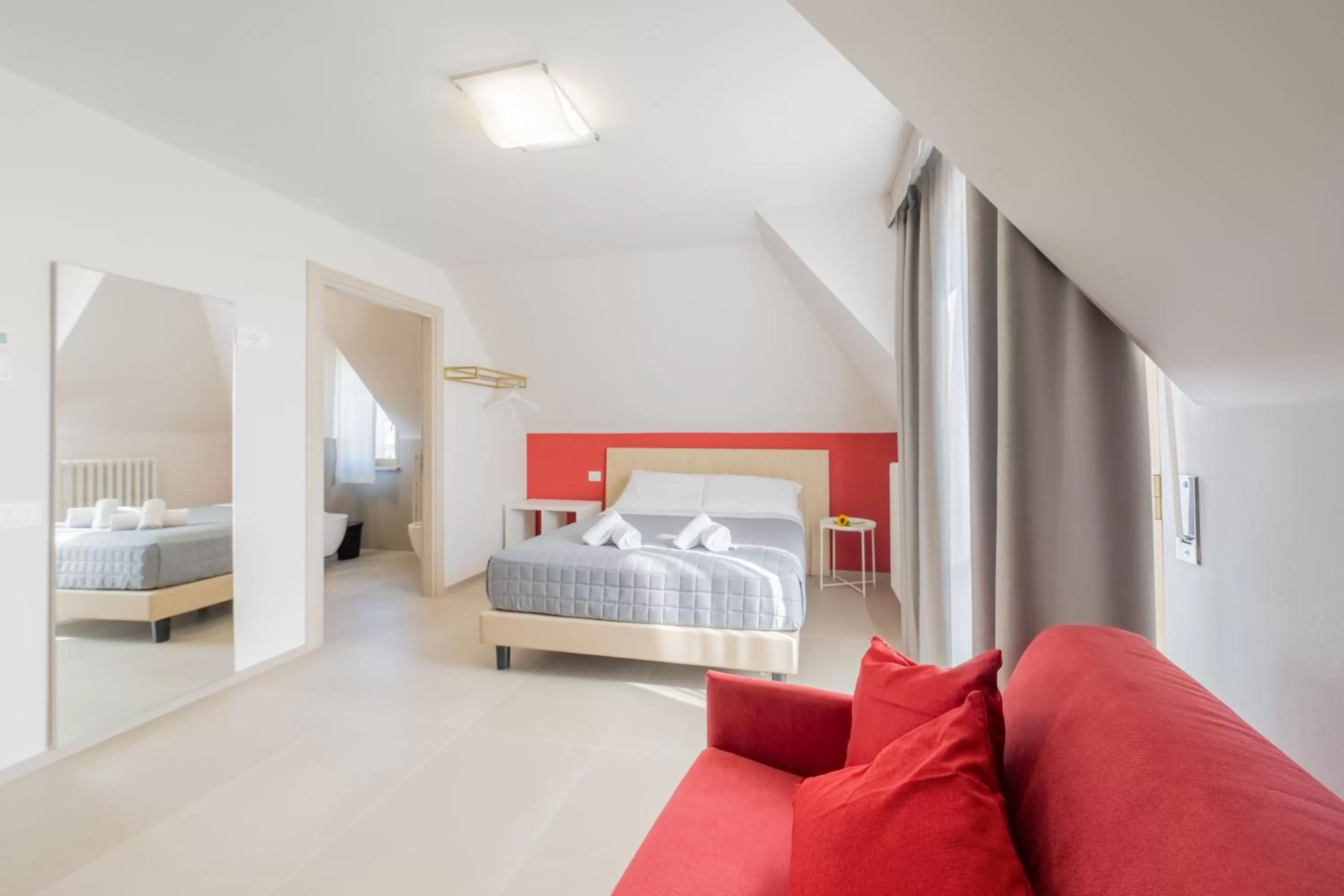 Bed in Dea Suite Room