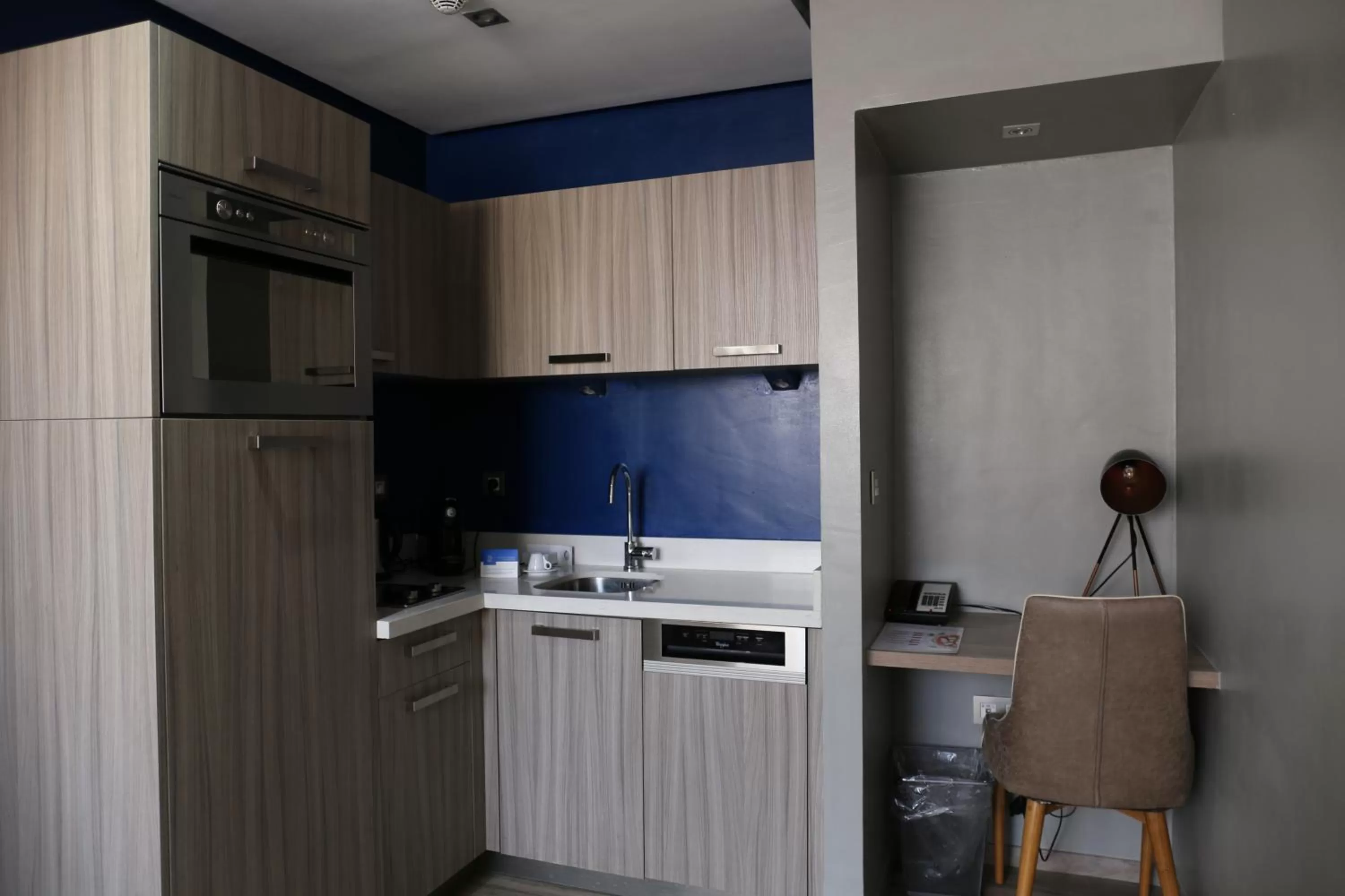 Kitchen or kitchenette in Le 22 Appart'Hotel