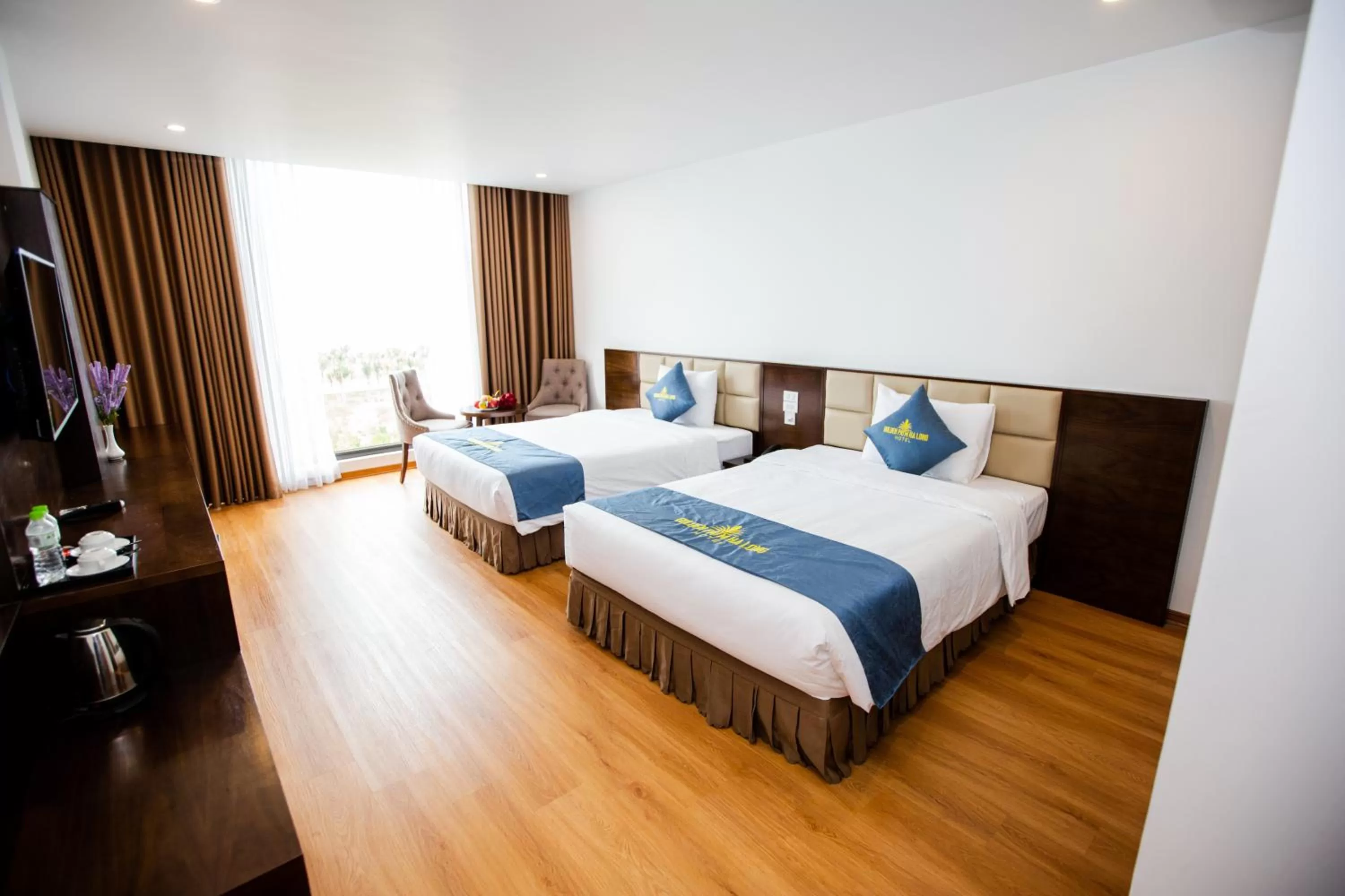 Bed in Golden Palm HaLong Hotel