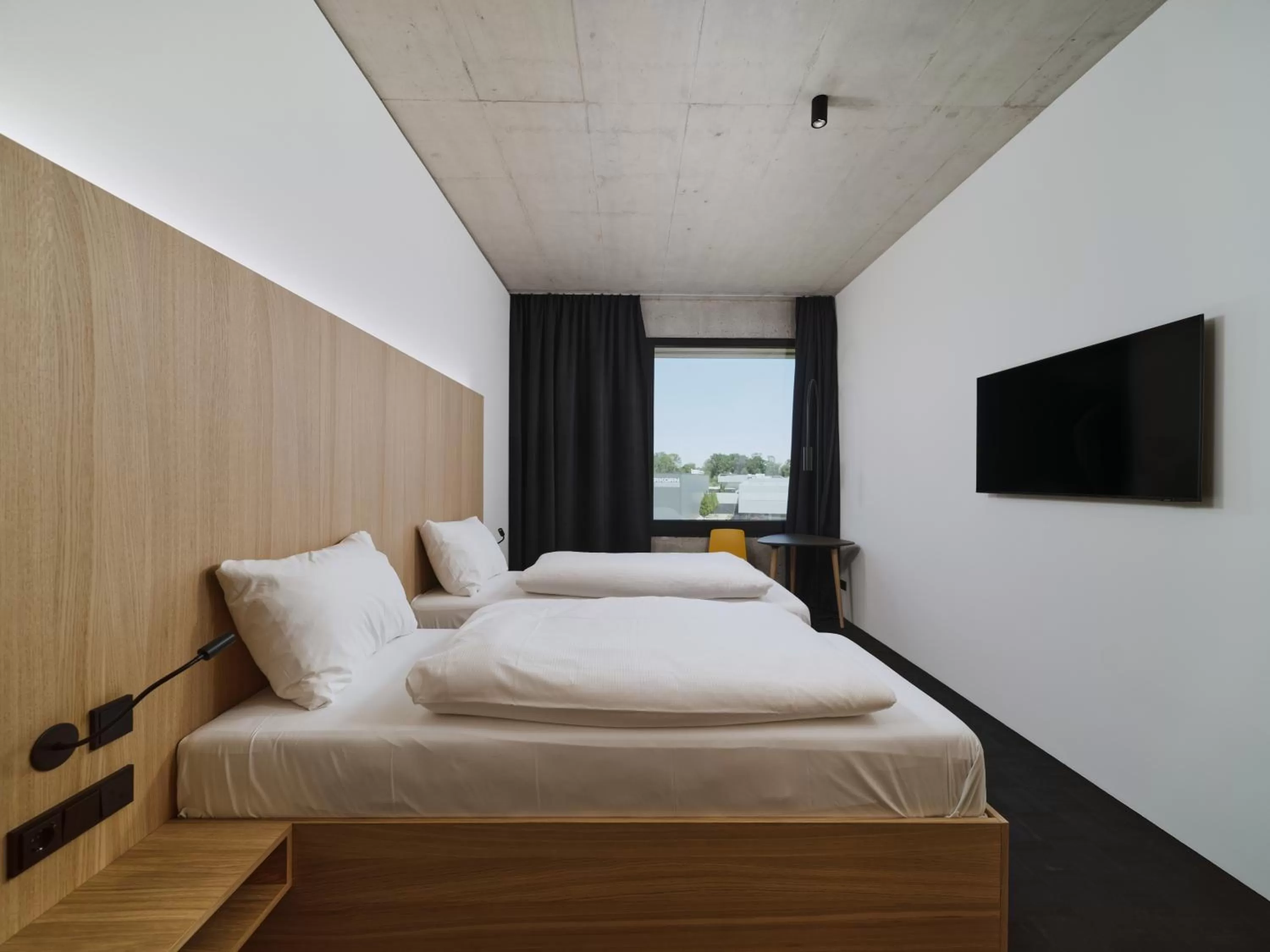 Bed in Boulderbar Hotel Self-Check in