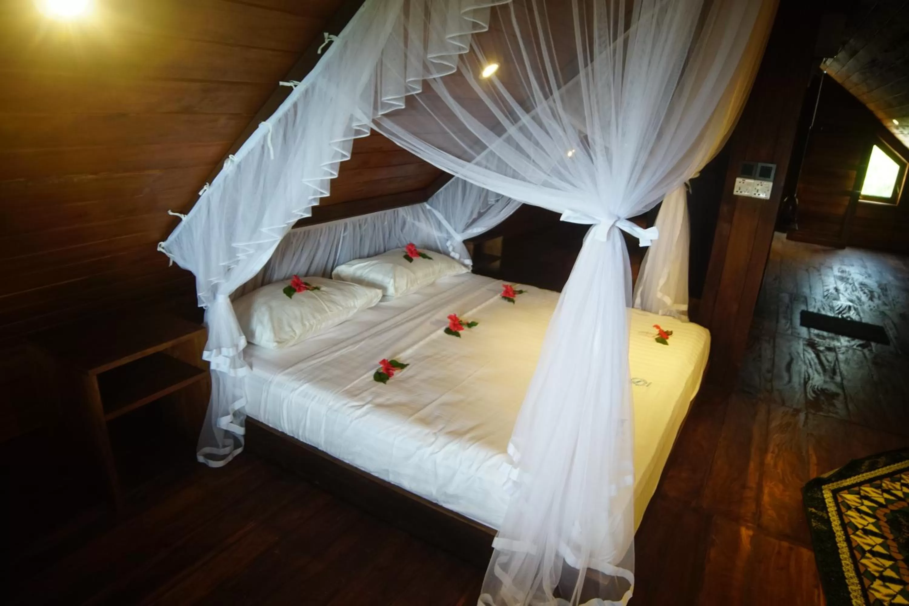 Bed in Turtle Bay Beach Resort