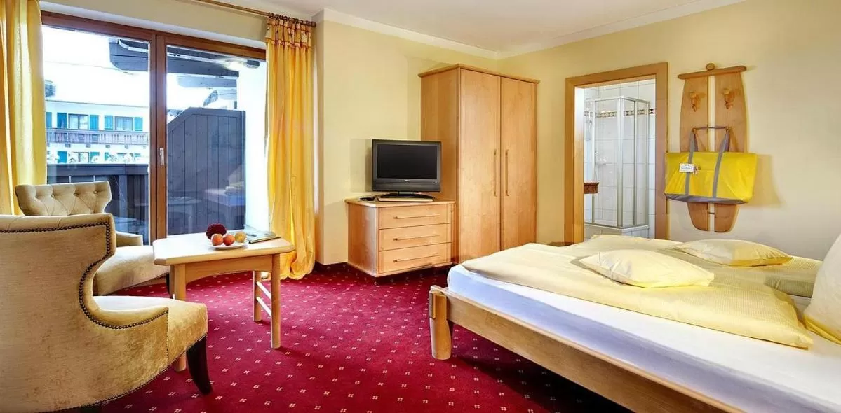 Bed in Hotel in the HEART of the Alps