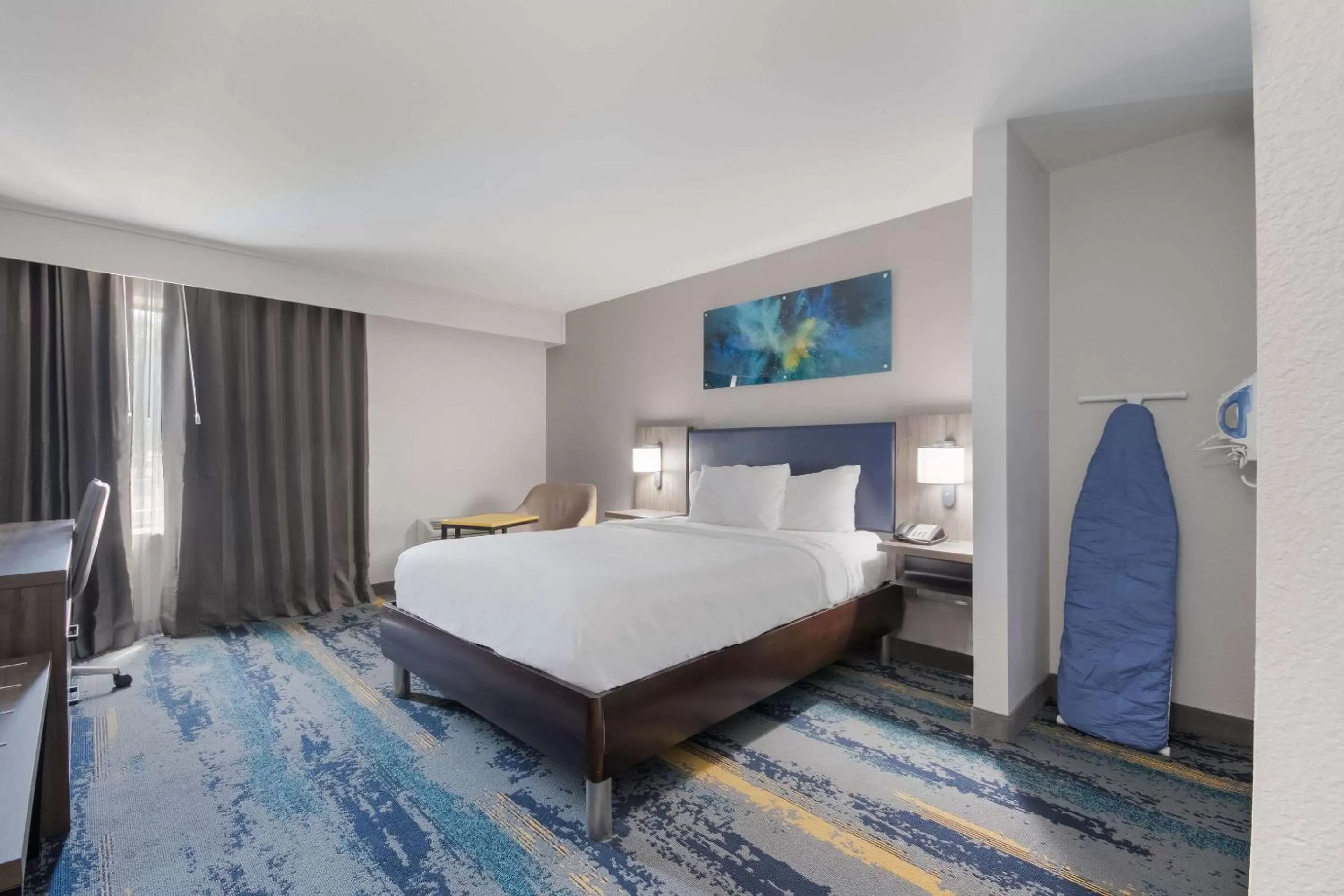 Bedroom in Clarion Pointe OKC Airport