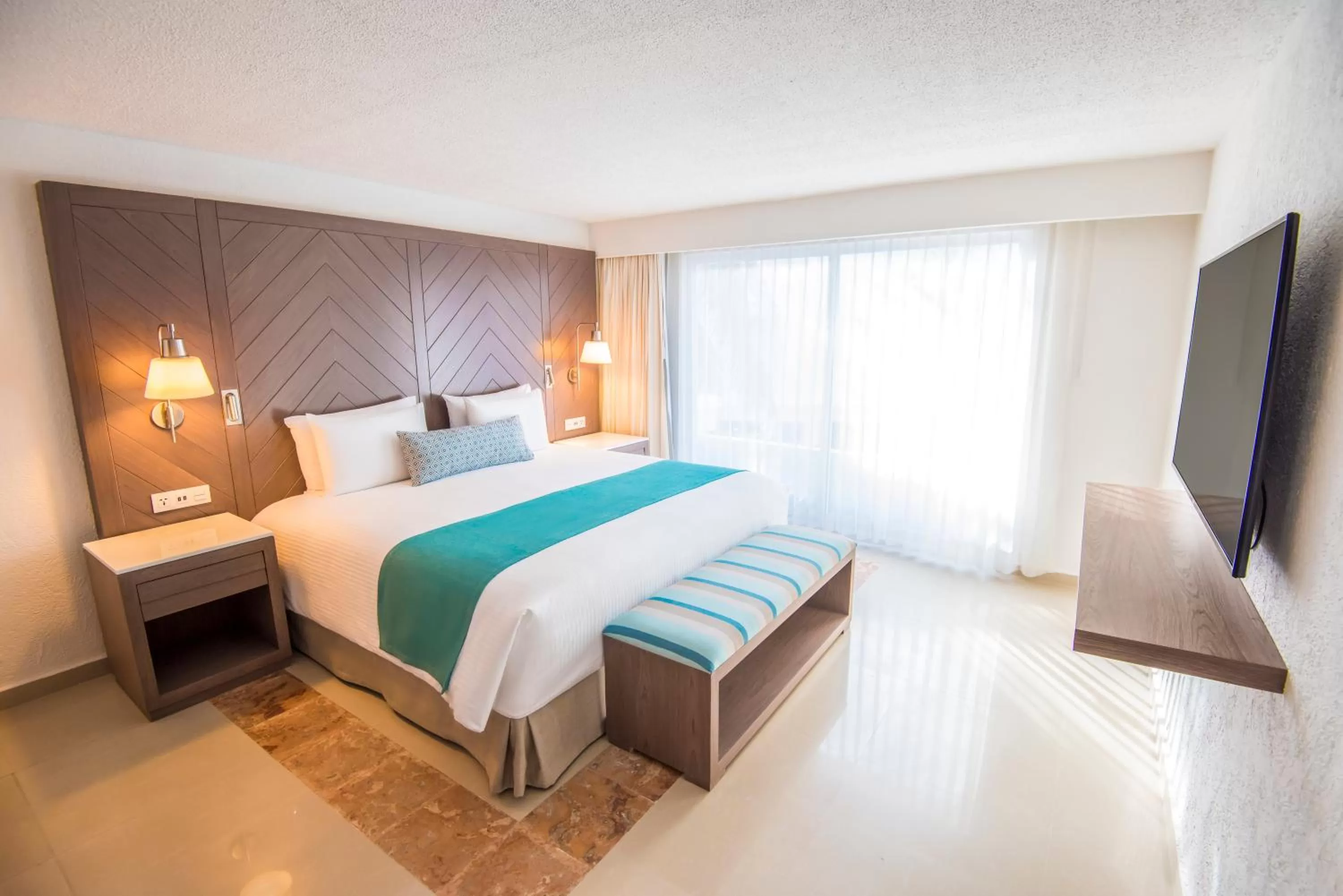 Bed in Wyndham Alltra Cancun All Inclusive Resort