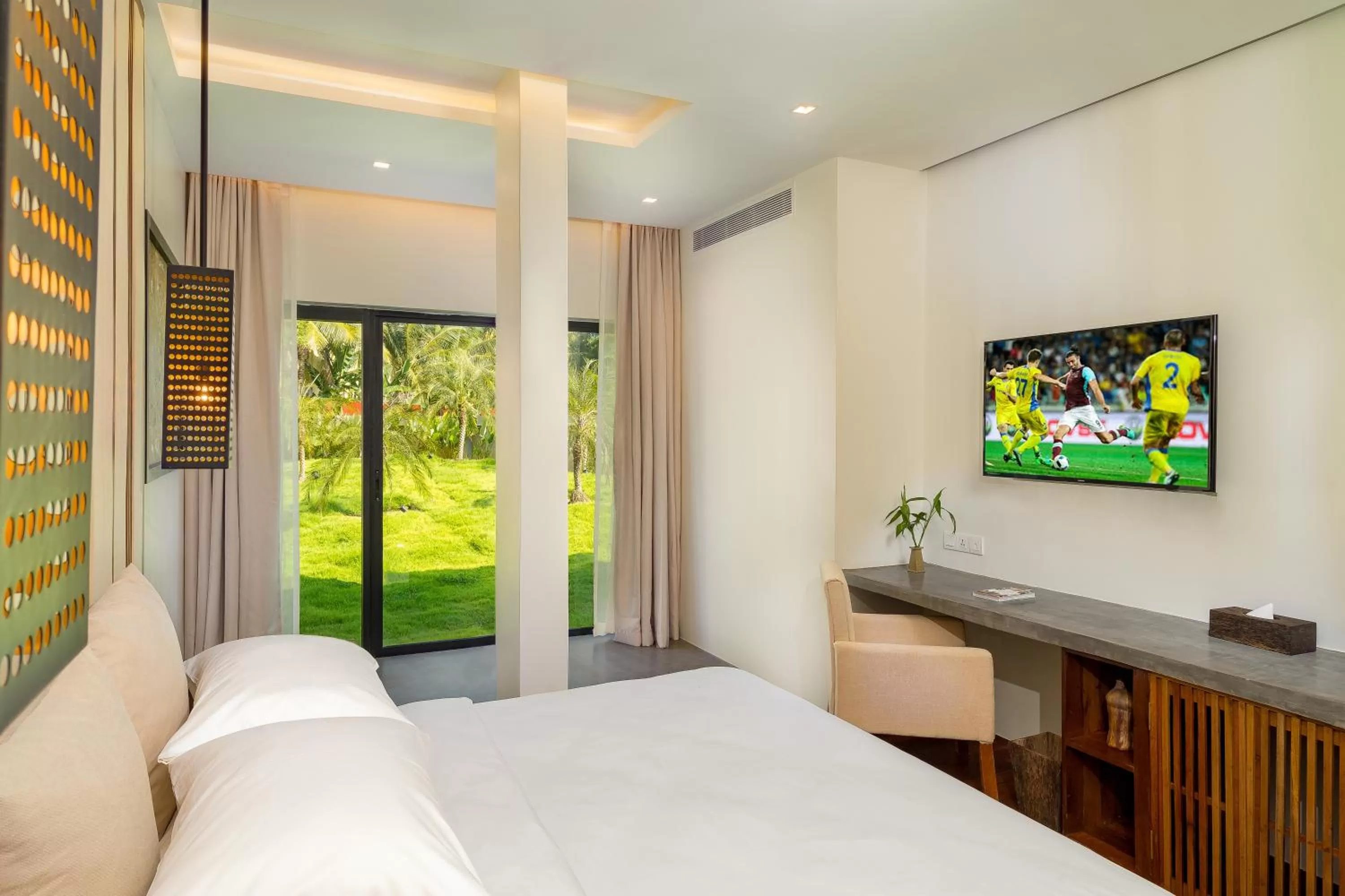 Communal lounge/ TV room, Bed in The Villa by Metta