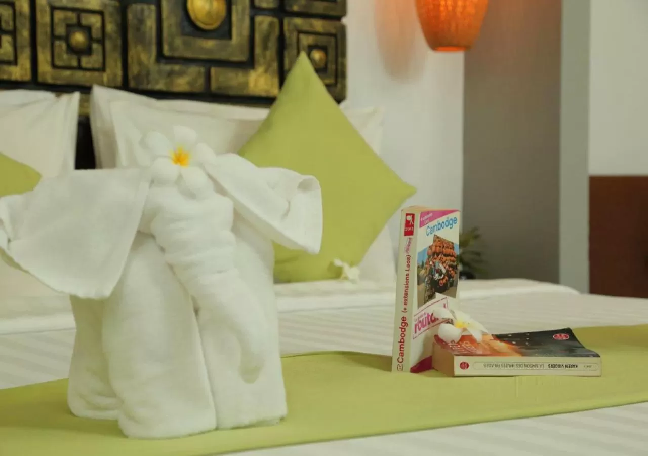 Bed in Ladear Privilege Rooms