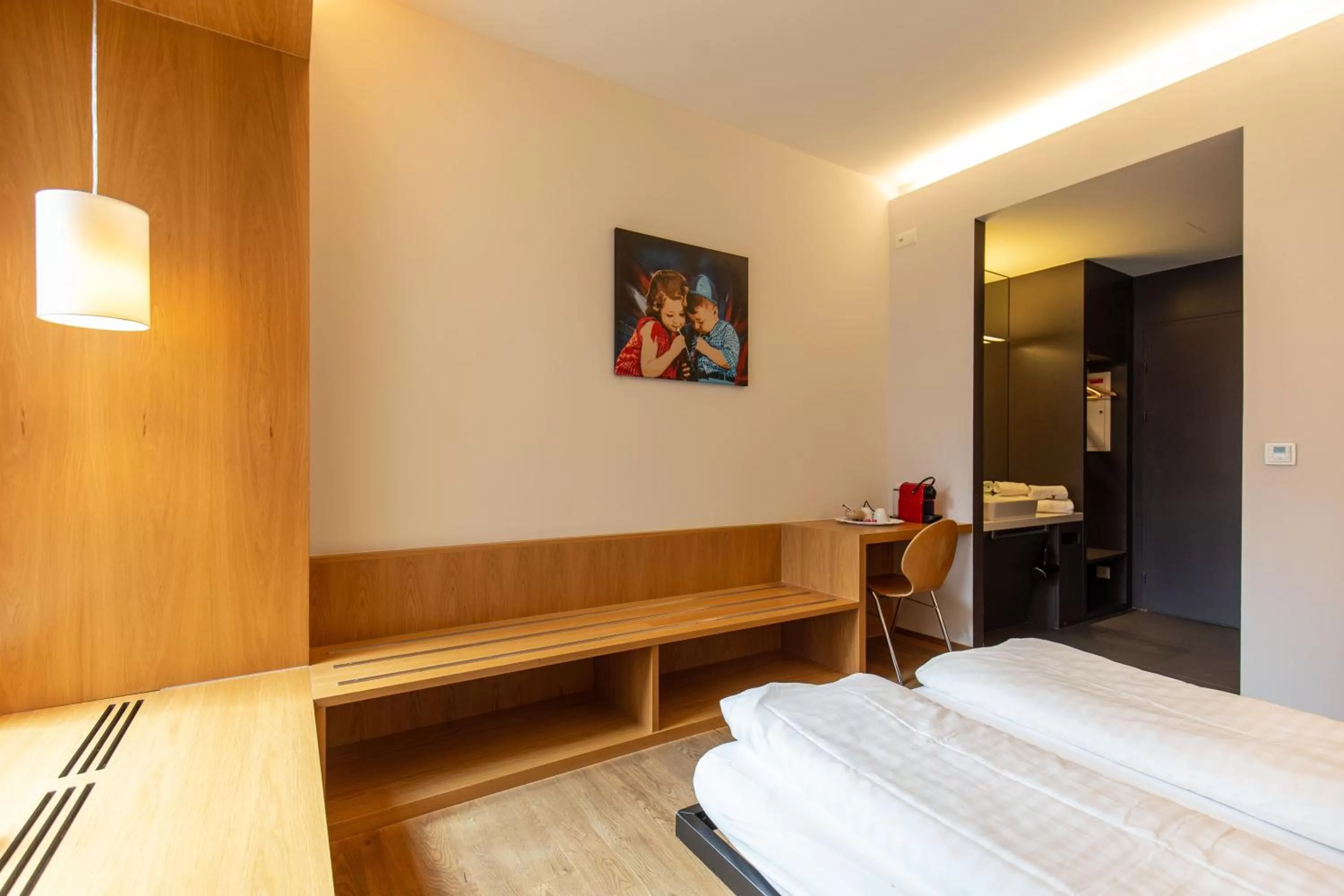 Photo of the whole room, Bed in Hotel by Hyve Basel