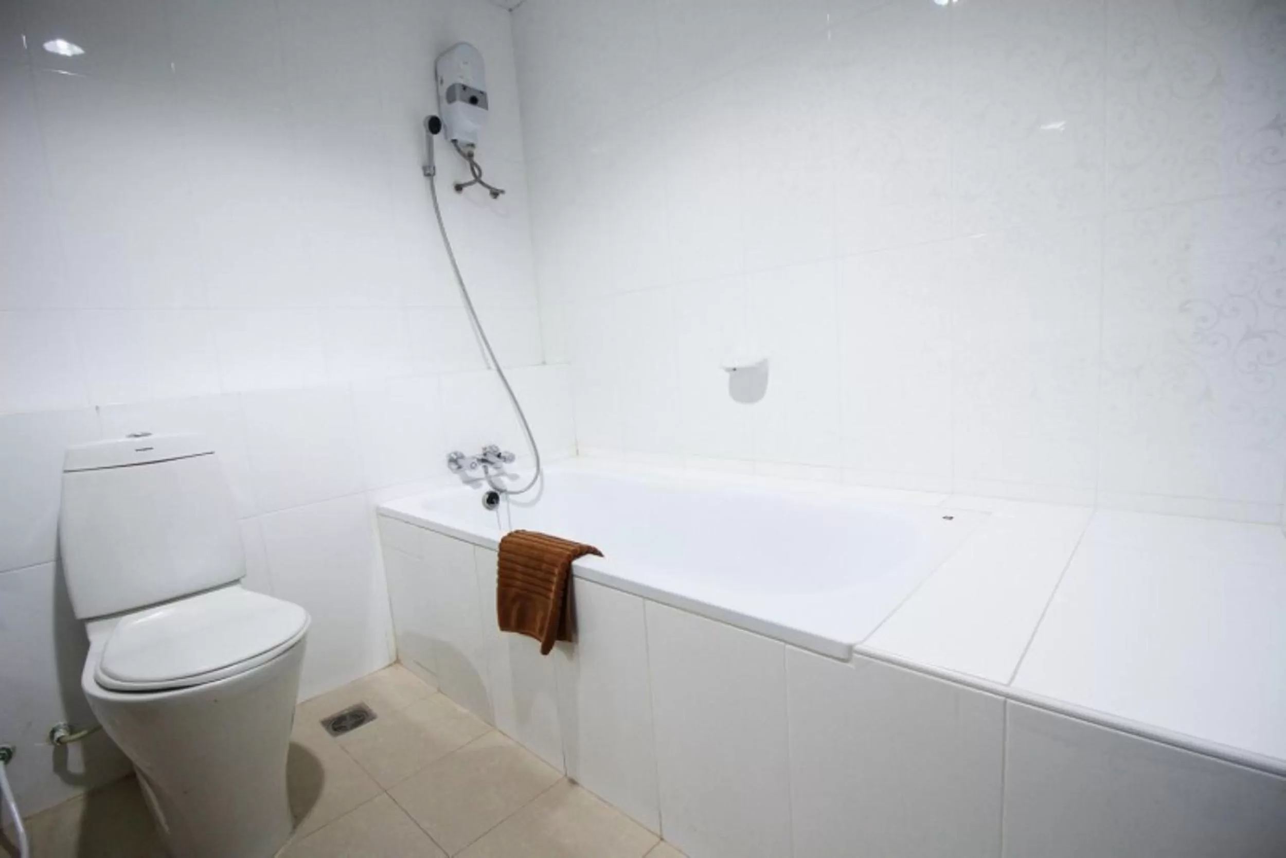 Bathroom in Convenient Grand Hotel