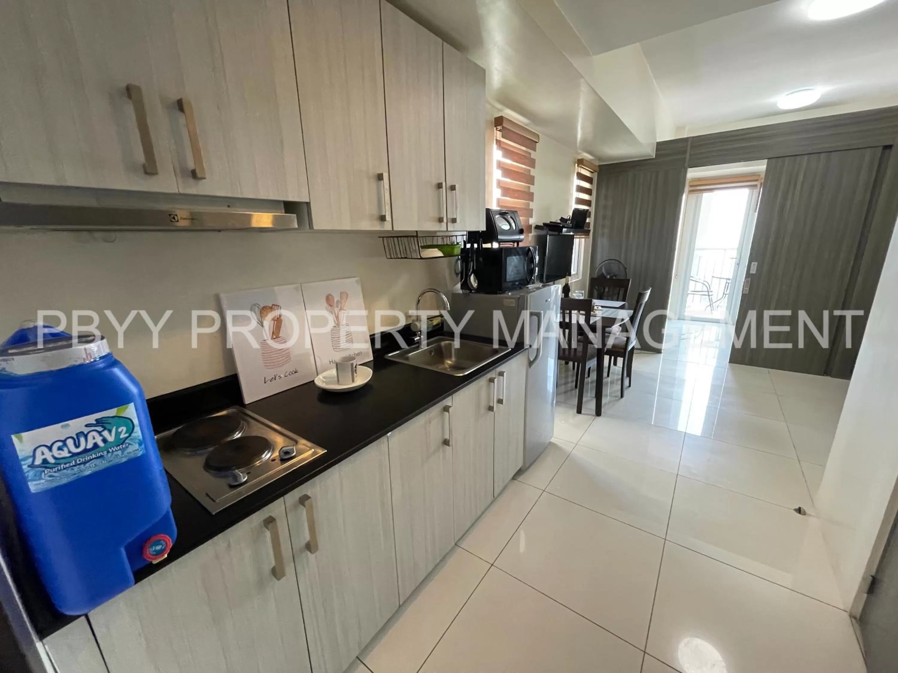 Kitchen or kitchenette, Kitchen/Kitchenette in Green Residences Staycation by PBYY