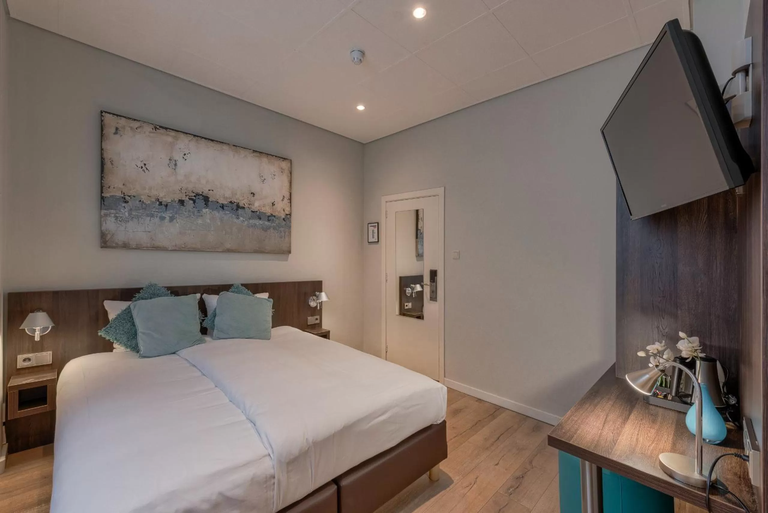 Bed in Hotel Damsquare