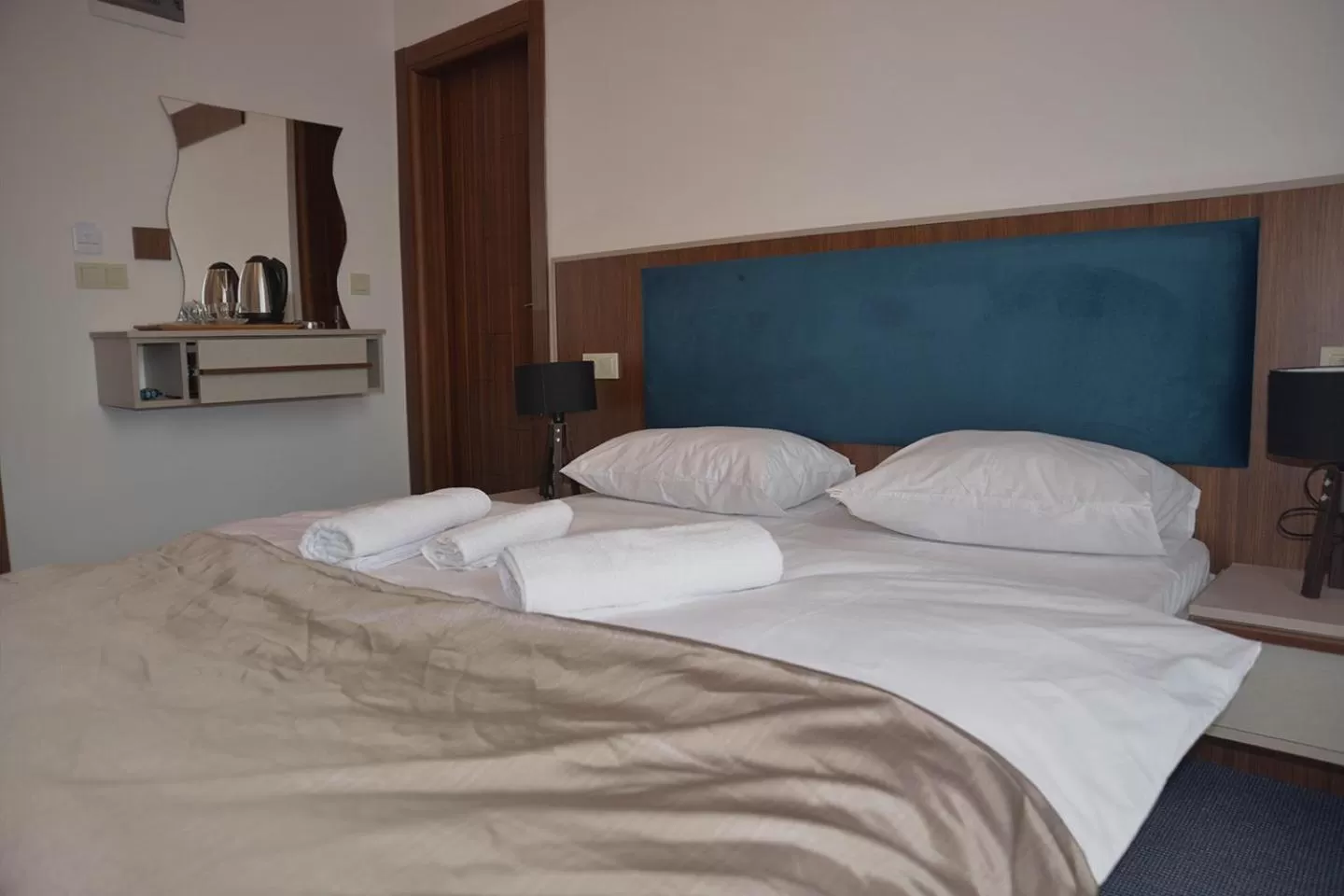 Bed in TEVETOGLU HOTEL